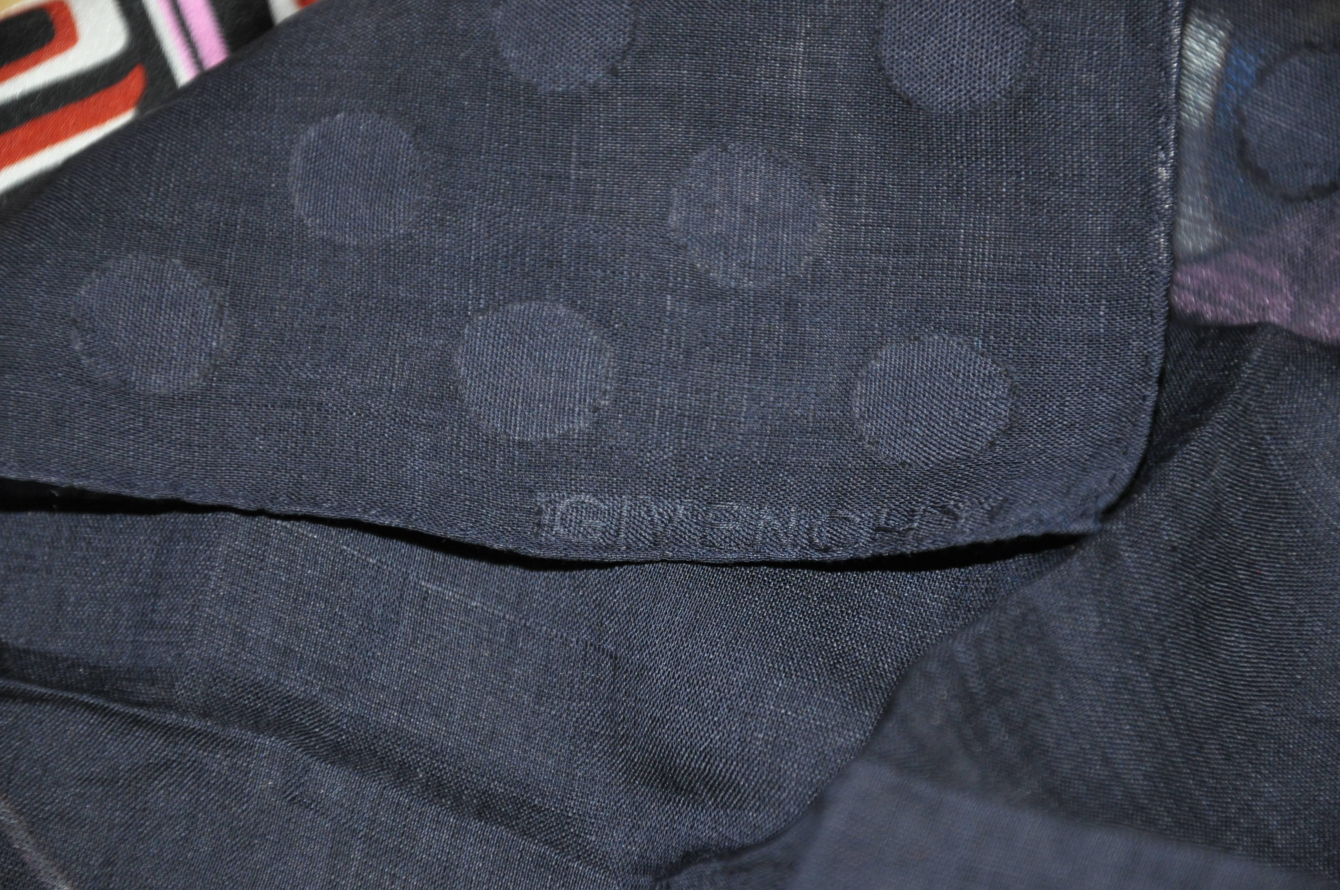       Givenchy's wonderful detailed set of linen dark navy polka-dot men's handkerchiefs which measures 12