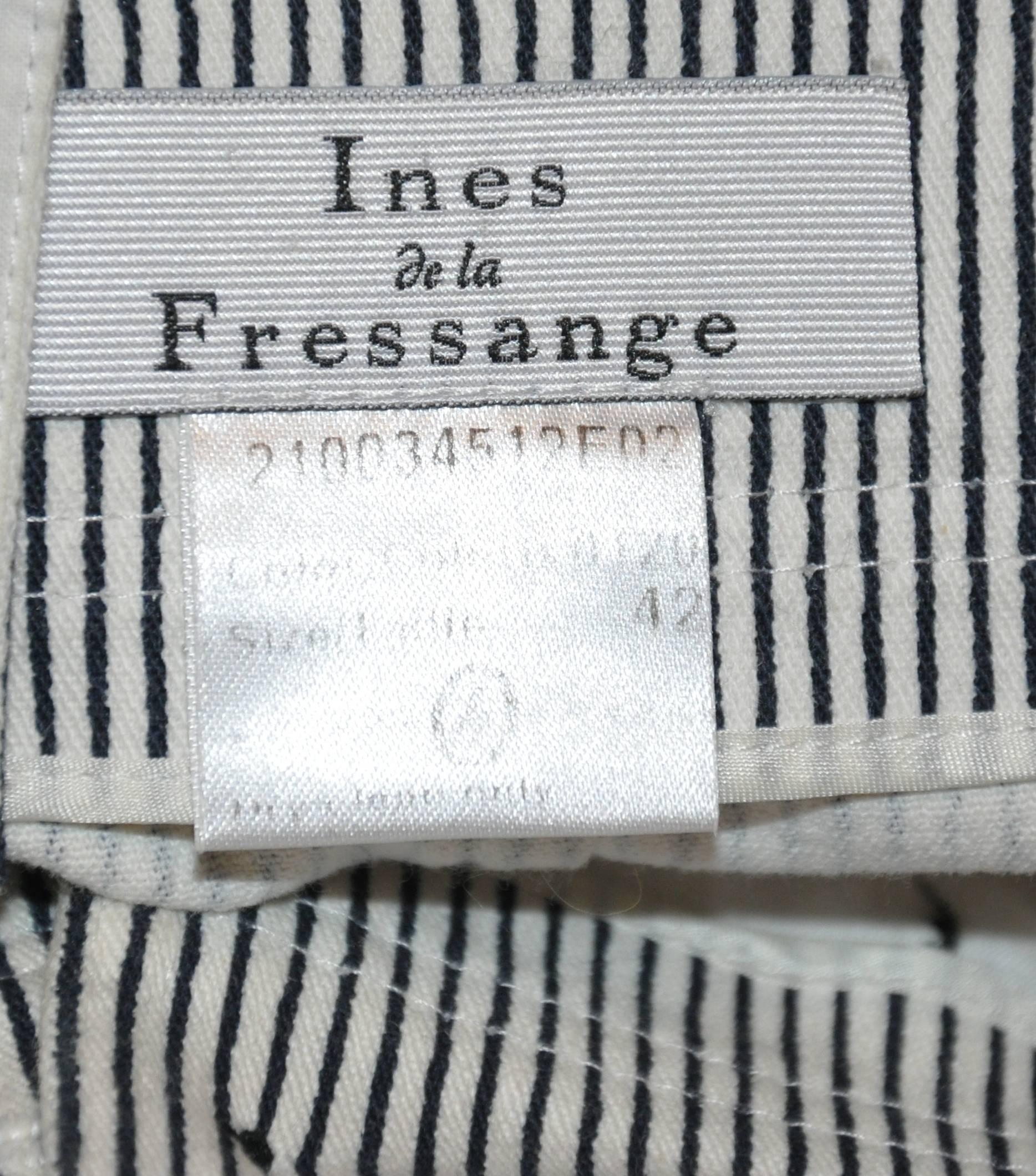           Ines de la Fressange wonderfully detailed black & white cotton combined with spandex sailor-style trousers has the optional tie-back on the center back waistband. The front has detailed buttons as well as 1 3/4