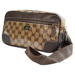 2000s Gucci GG Crystal PVC and Brown Leather Belt Bag
