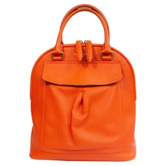 Borsa Burberry in pelle martellata color papaya con manico superiore, anni 2000