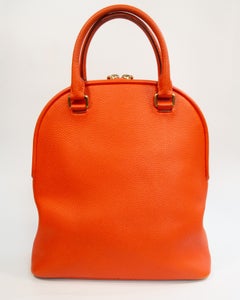 Borsa Burberry in pelle martellata color papaya con manico superiore, anni 2000
