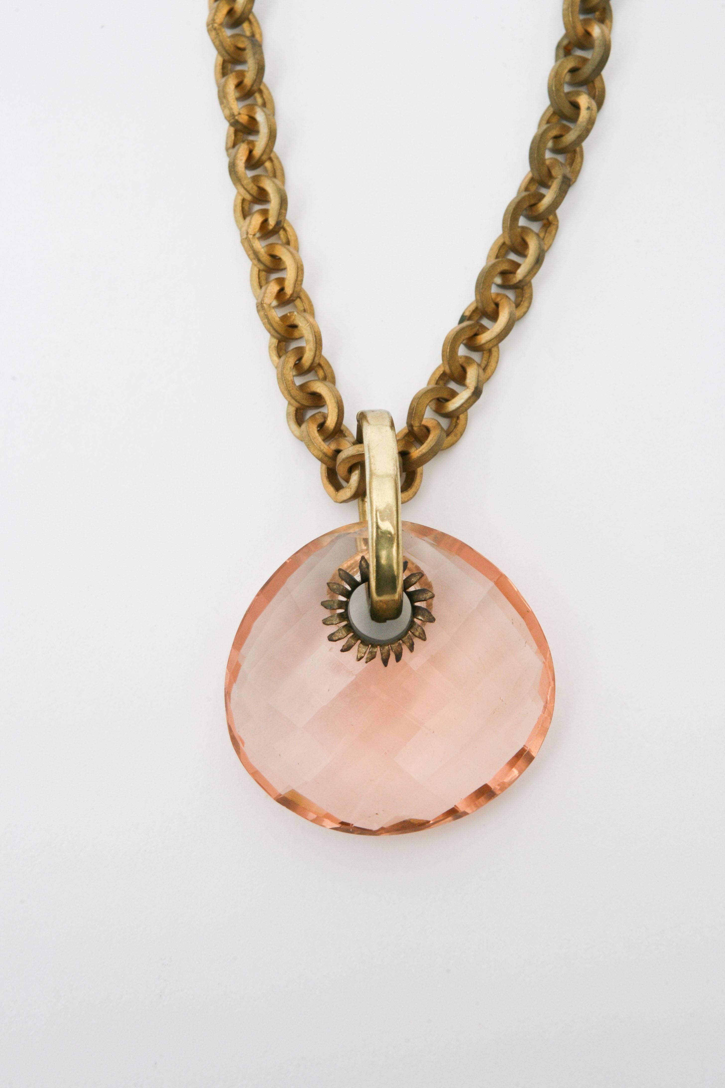 This bold and drop dead gorgeous vintage Italian necklace is not signed but has great artisan design and work. The peachy pink diamond faceted glass is large, dramatic yet has a softness to it against the link chain. It makes a statement of beauty