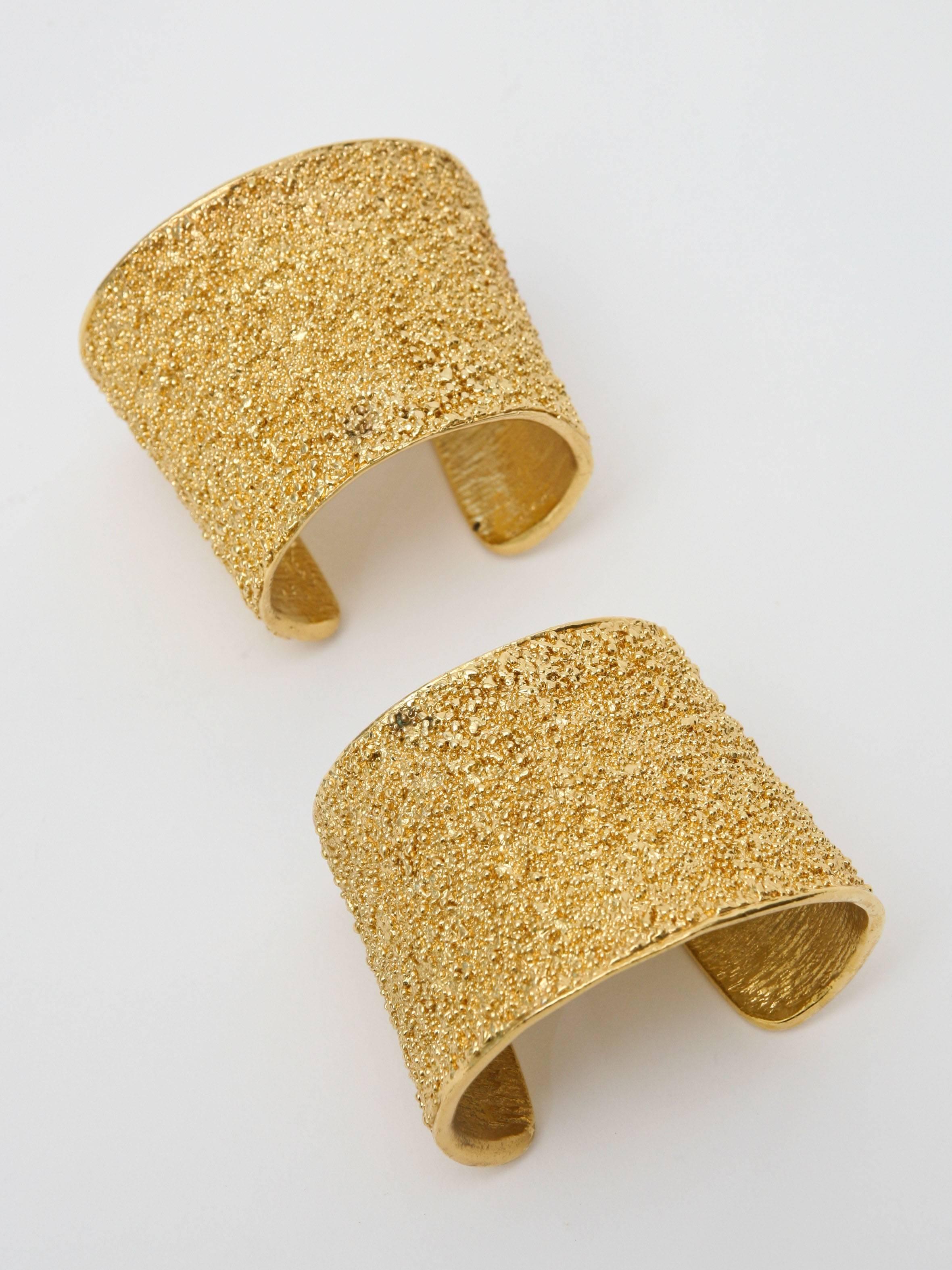 Pair of Signed Yves Saint Laurent Textural Gold Plated Cuff Bracelets In Good Condition In North Miami, FL
