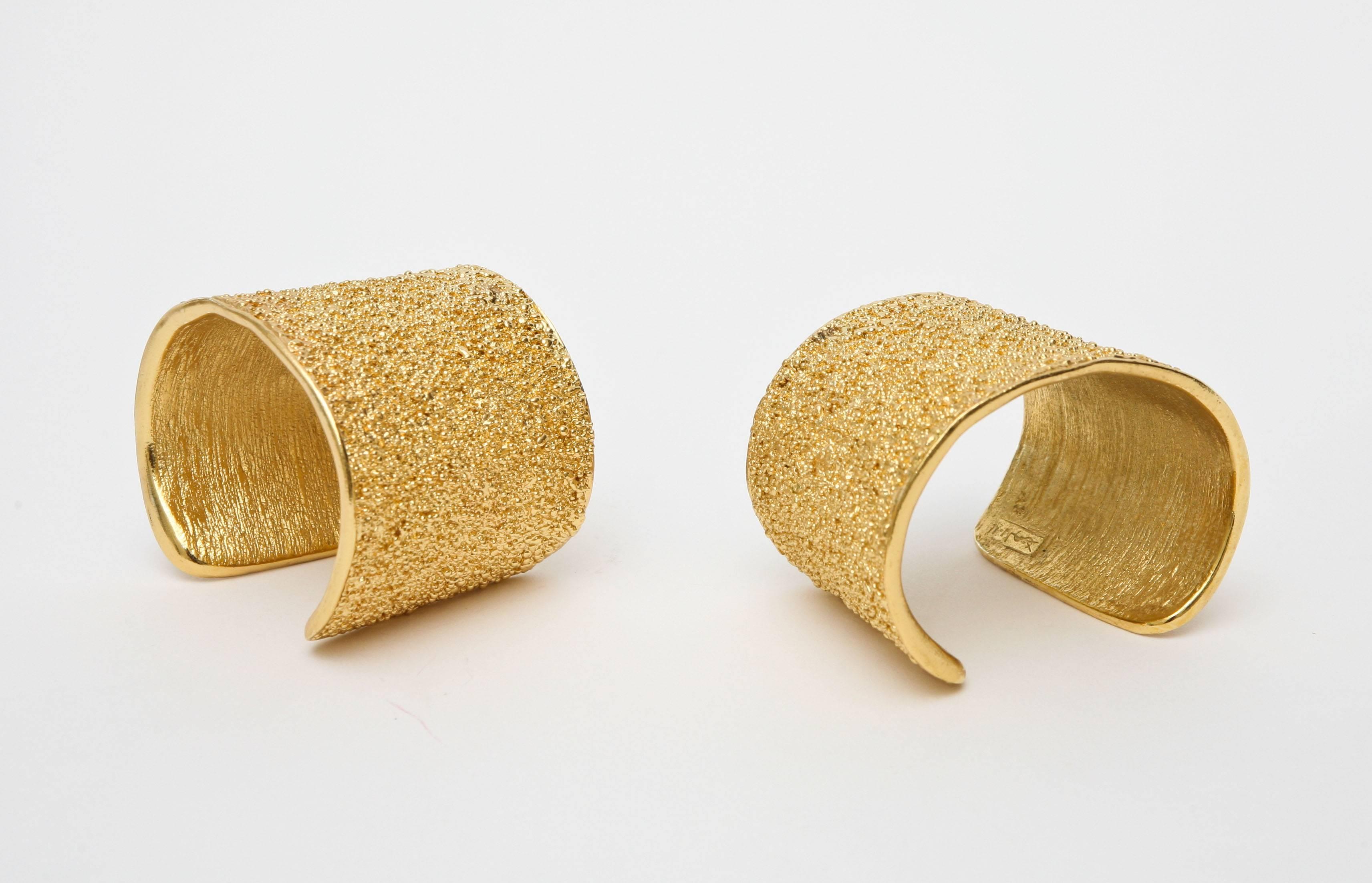 Modern Pair of Signed Yves Saint Laurent Textural Gold Plated Cuff Bracelets