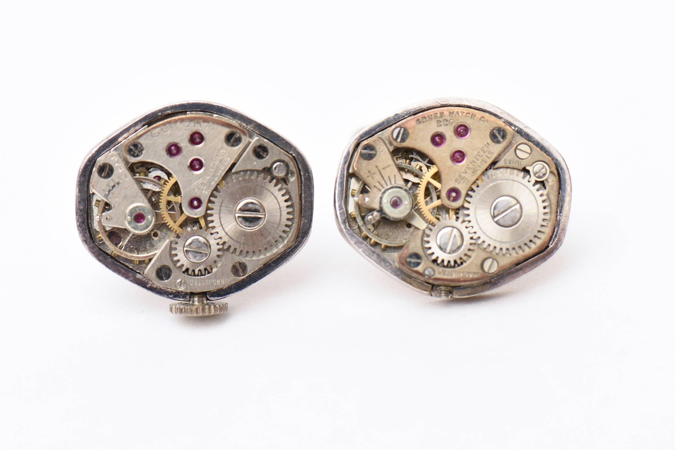 These intricate and moveable watch parts fascinate the eye. These cufflinks are most unusual and are jeweler made. They are one of a kind. Fascinating workmanship involved in making these cufflinks. They are marked Sterling silver 925 SWISS and