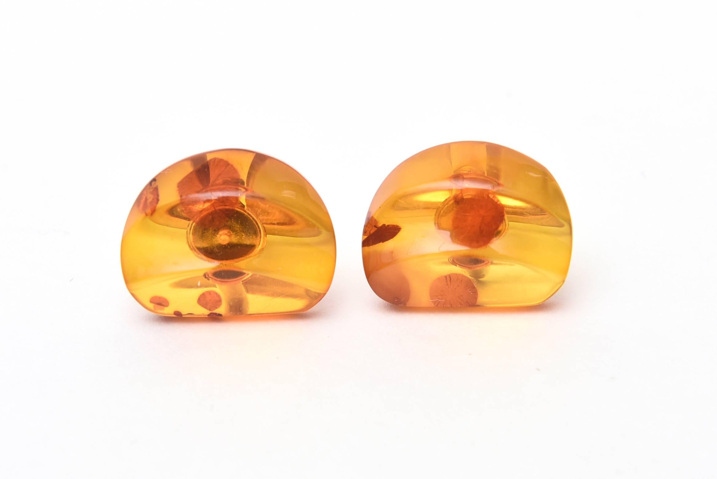 These wonderful pair of amber resin cufflinks in their original vintage box are so modern today. Perfect for a man or a woman. They are vintage from the 60's. They have never been worn.
