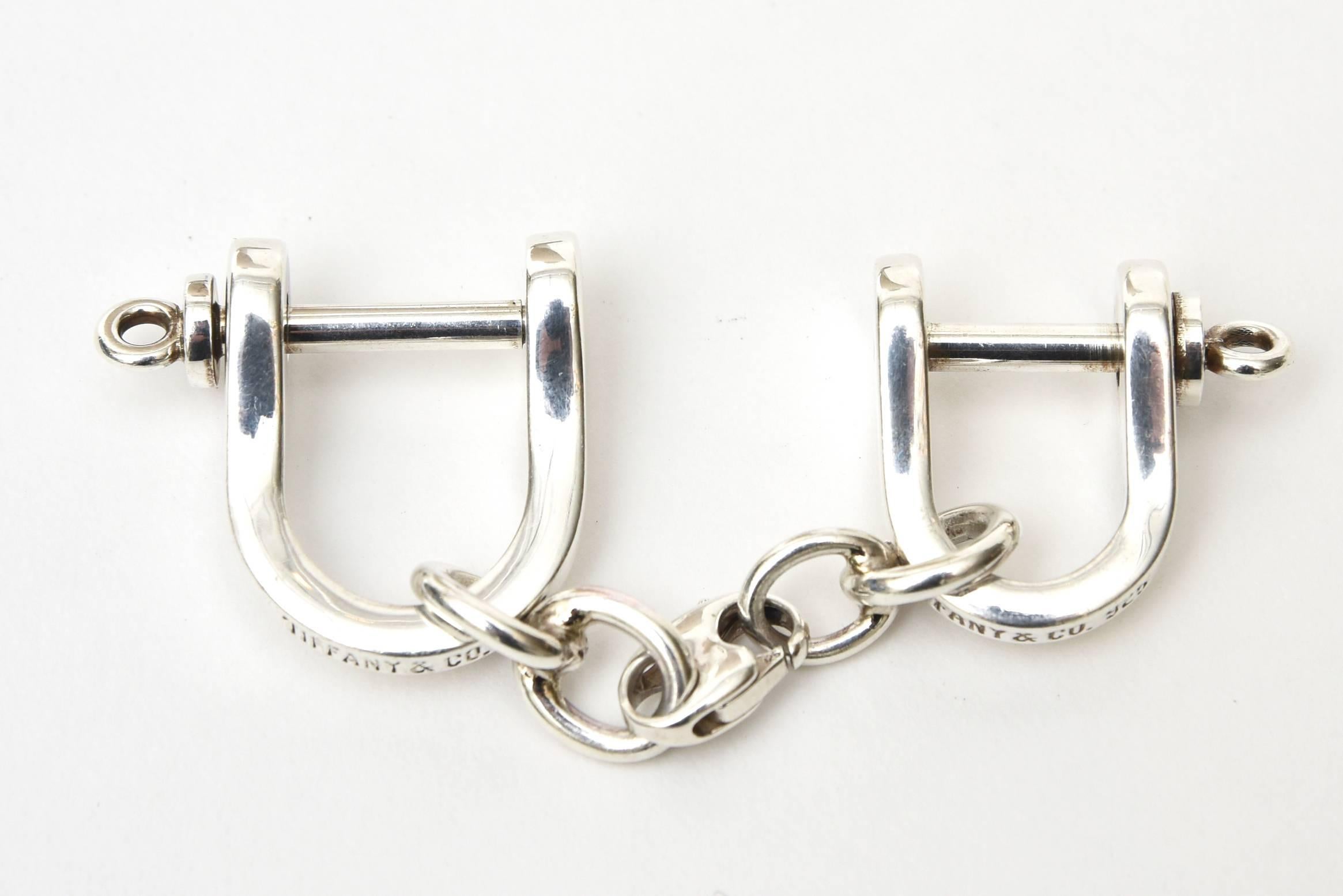 This now hard to come by hallmarked Tiffany sterling silver key chain has a detachable link for the valet. It is called Shackle and Hook. Marked Tiffany 925. These were produced in limited quantities even back in the 80's. The length with both ends