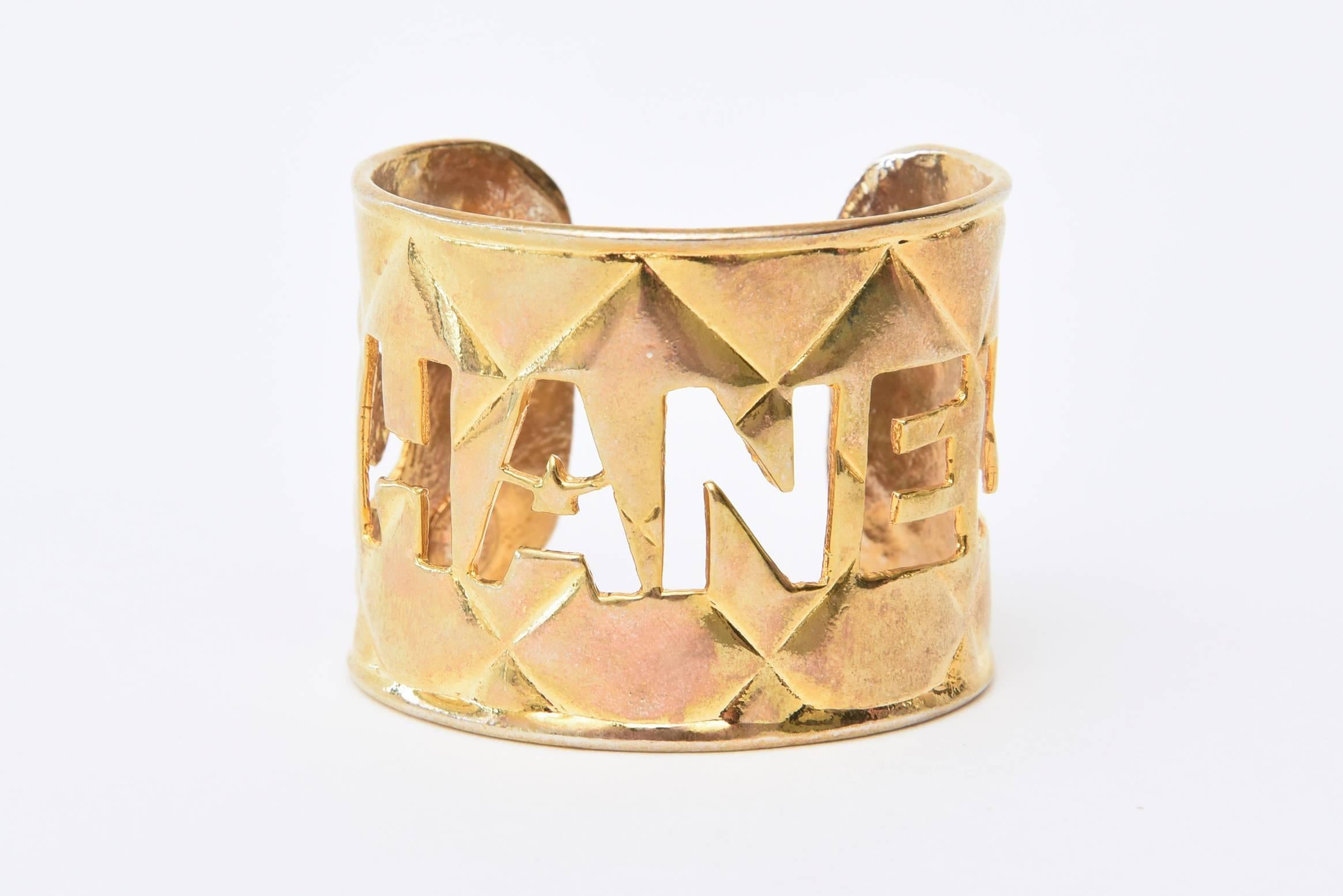 Chanel Gold Plated Quilted Logo Cutout Cuff Bracelet In Good Condition In North Miami, FL