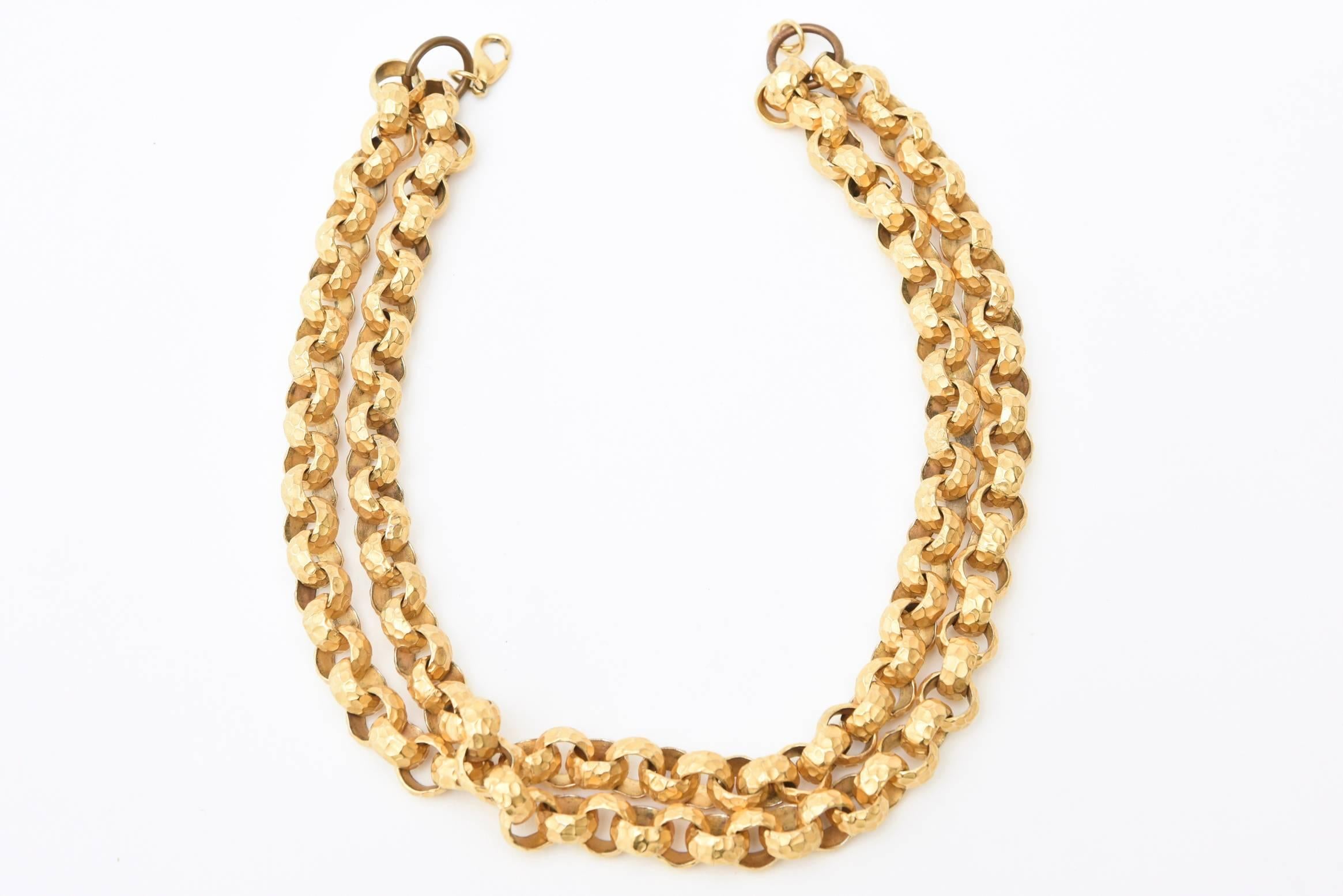 This has the right look at the right price. It is a heavy, substantial and a chunky double link gold plated necklace from the 70's. The gold has been hand hammered and is a wonderful look. Link chain necklaces are always in vogue. Great for fall