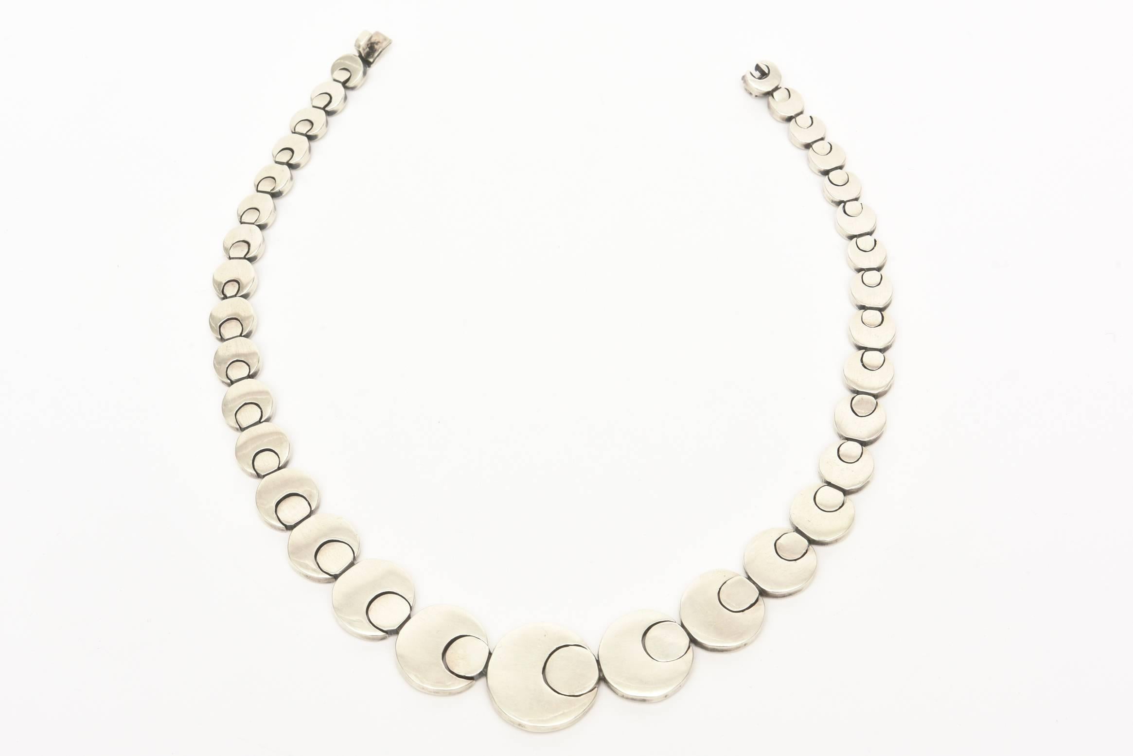 This stunning sculptural reticulated vintage sterling silver necklace sits beautifully on the neck/chest. It has has great weight to it. Very finely made and forever modern and timeless. It is hallmarked Mexico 925 TO-45. It is from the 70's. Goes