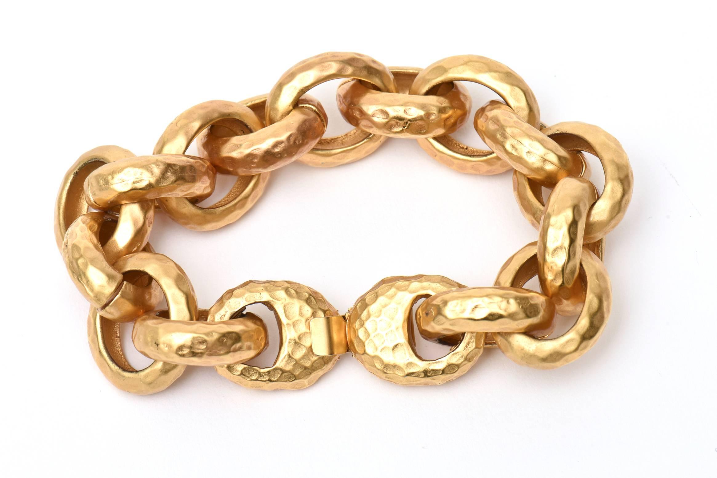 This versatile and stunning gold plated chain link bracelet looks like the real thing.
It is hand hammered and fits the wrist beautifully. It has a textural nature from the hand hammering. Great for everyday use  and can go day to evening. This is a