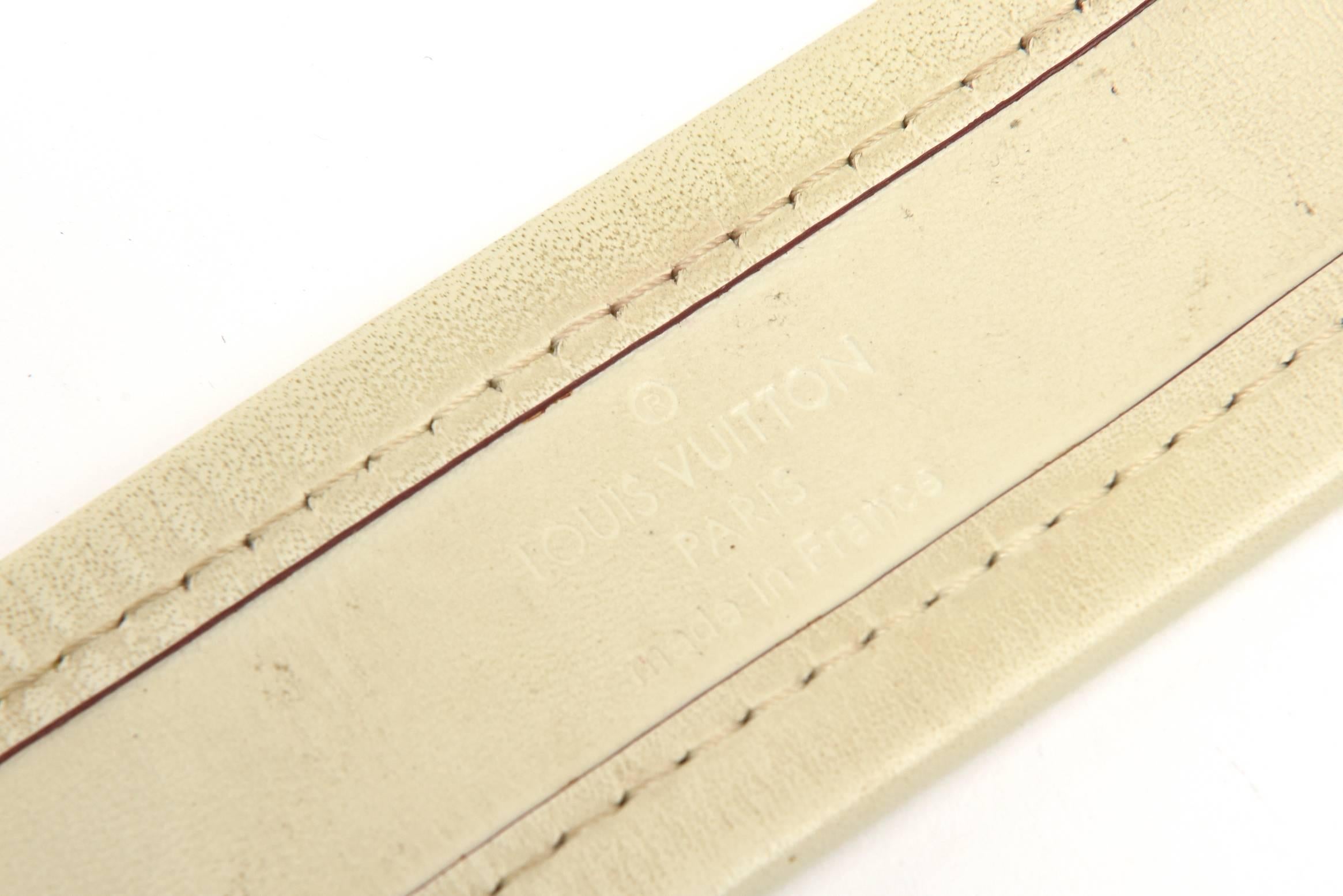 Manschettenarmband von Louis Vuitton aus Leder und vergoldeten Messingbeschlägen 1