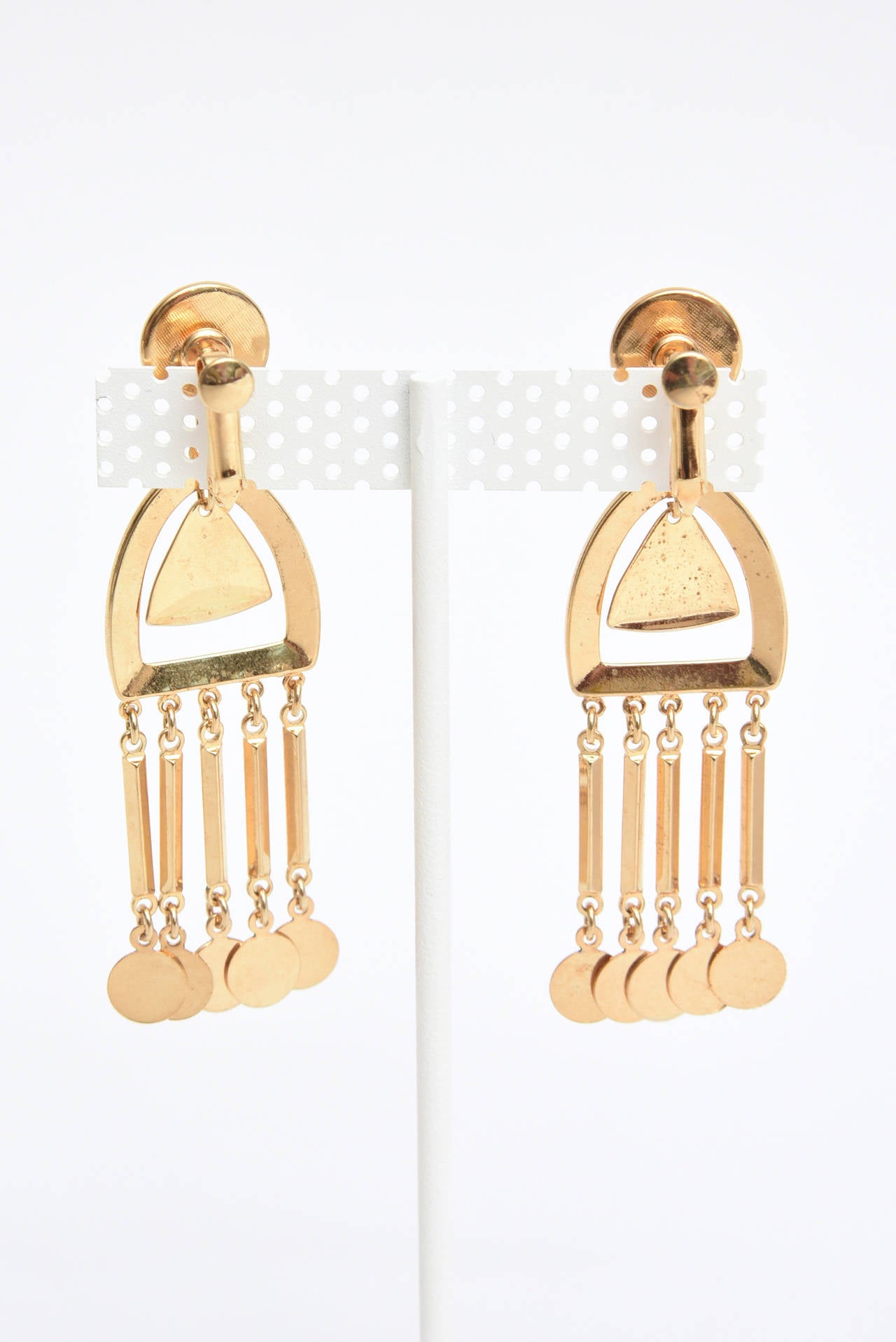 These fantastic vintage Vendome modernist dangle or chandelier pair of earrings are from the 60's. They are sculptural and attract the eye. They are gold plated. They have the scew backs. These still withstand 55 years when they were made and are so