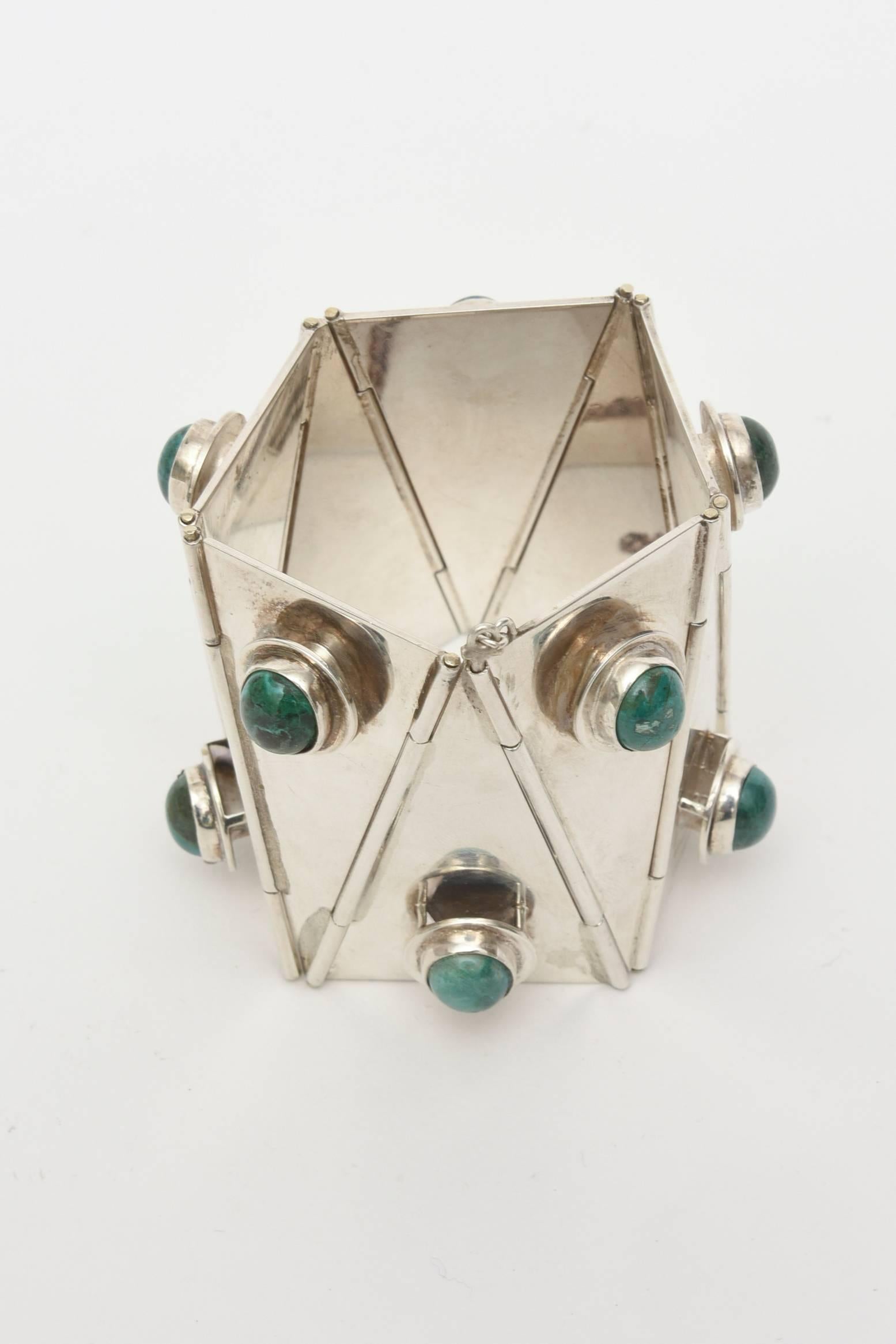 This amazing and spectacular studio made one of a kind vintage cuff bracelet of Sterling Silver & Malachite, is a 