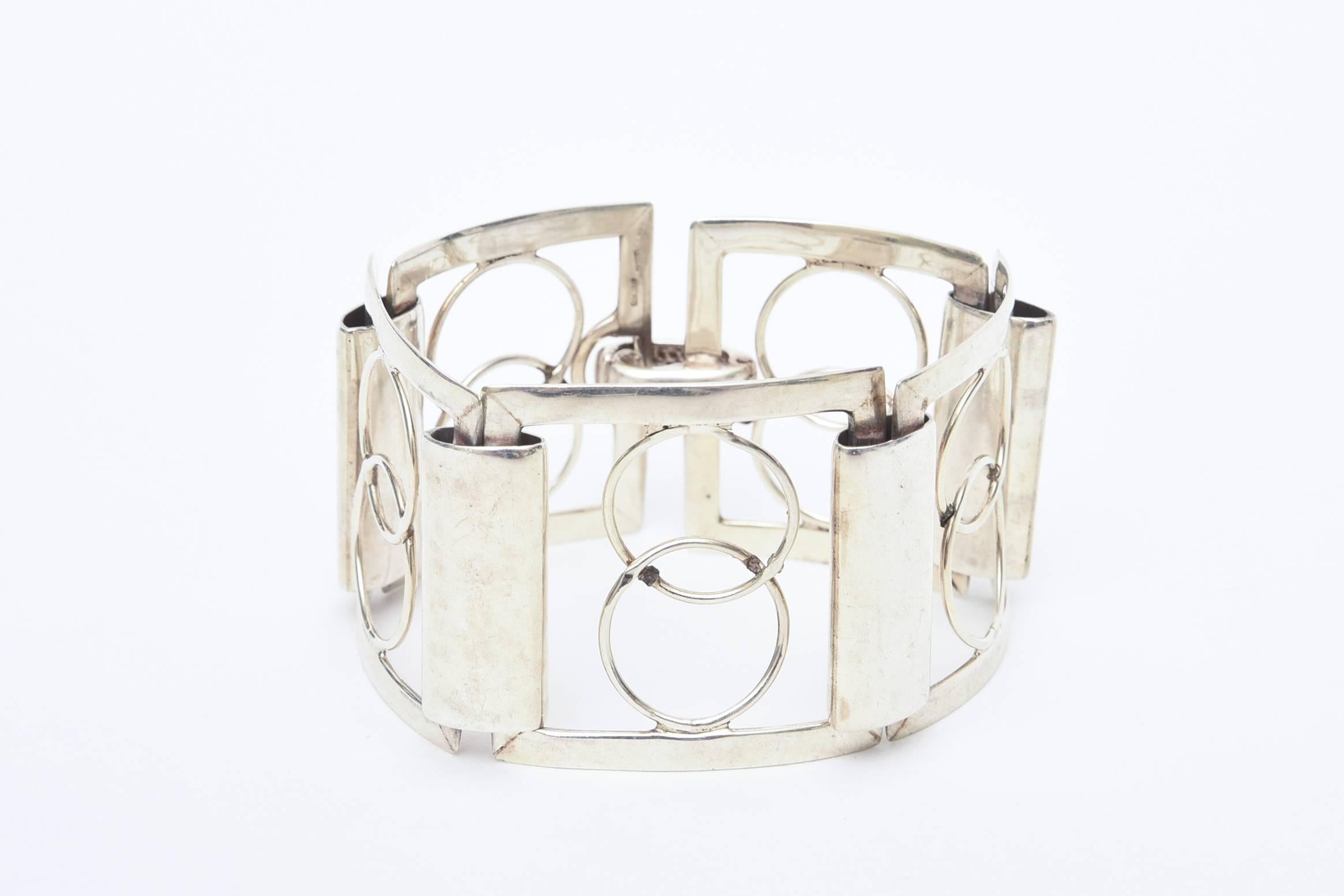 This gorgeous, modern and oh so chic vintage geometric sterling silver Italian cuff bracelet is signed P.R.X. 925 Italy. This was a workshop of artisans that have vanished. It is a forever bracelet with great modernist designs. This will never go