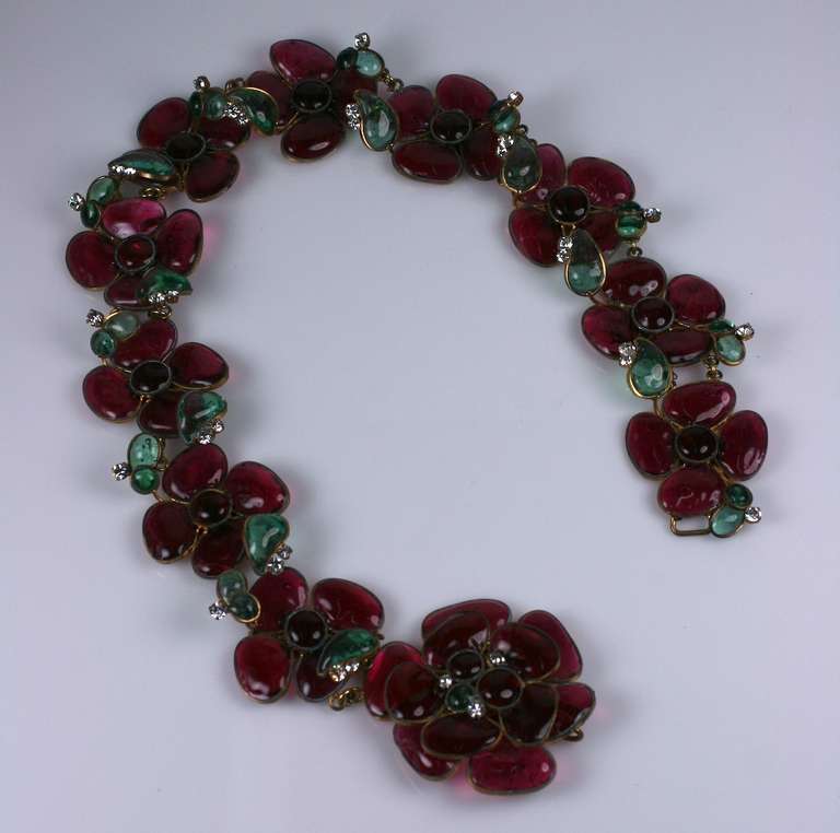 CoCo Chanel massive deep ruby, emerald pate de verre and crystal flower belt. One of CoCo Chanels self re inventions, refering back to her signature Fleur Emaille flower necklaces and brooches of the late 1930s. Made by Maison Gripoix in CoCo