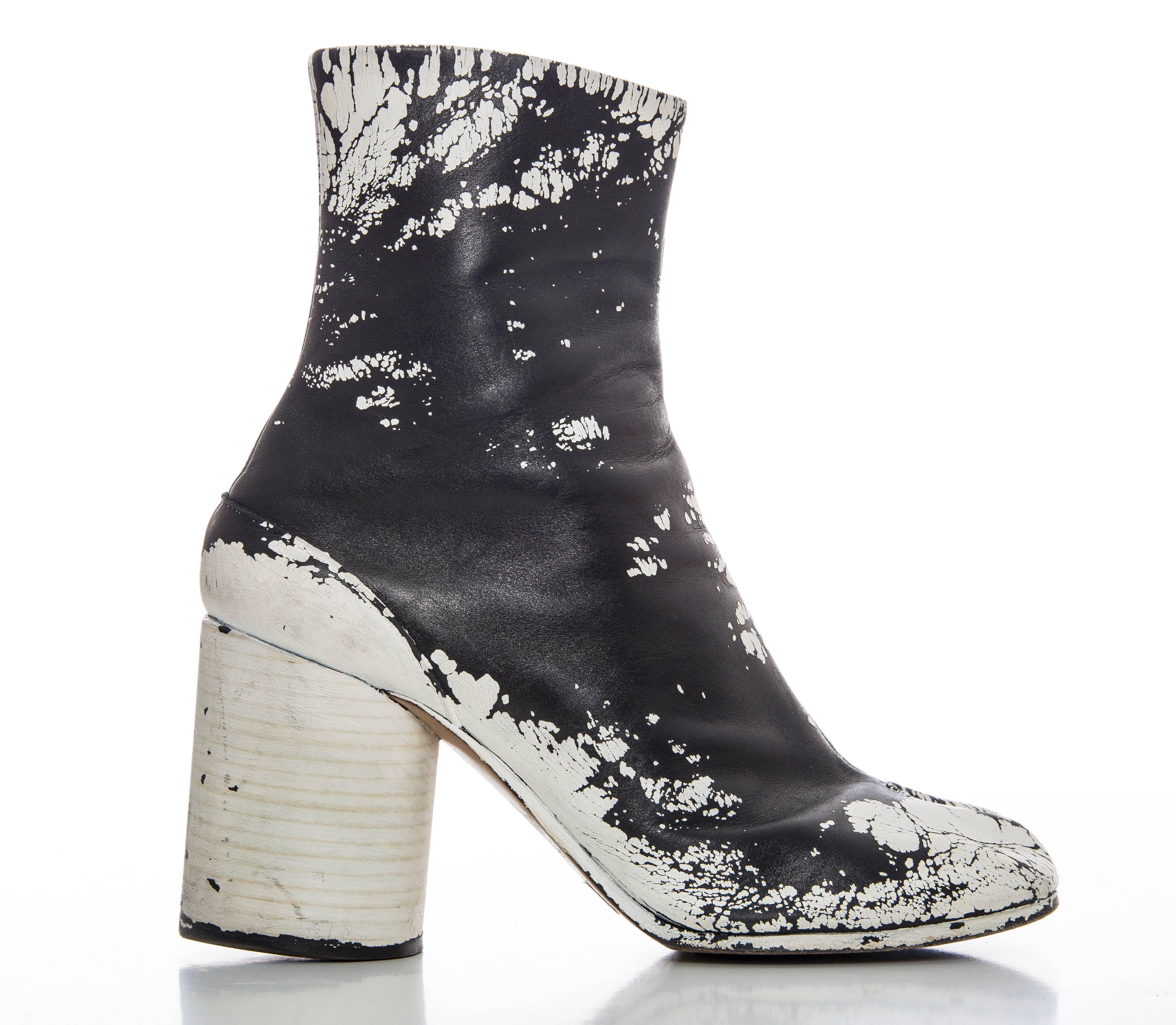  Maison Martin Margiela, circa 1990's,  painted Tabi boots with stacked conical heels and zip closure at sides.

EU 38
US 8