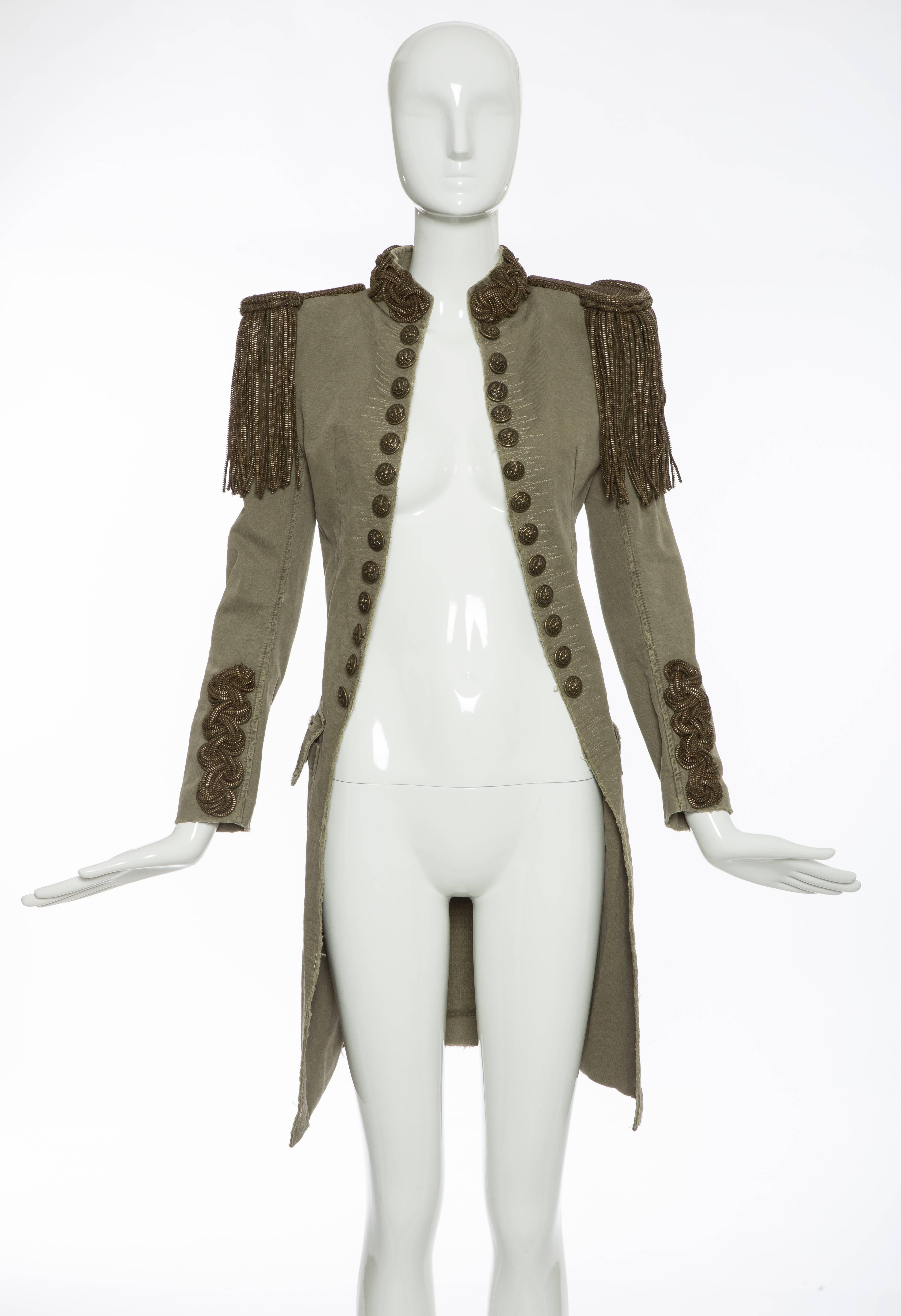 Balmain by Christophe Decarnin, Spring-Summer 2010, military jacket featuring zippered stand collar and cuffs, fringed zipper epaulets at shoulders, raw edge trim throughout, button accents at front, dual flap pockets and open front.

FR. 36
US.