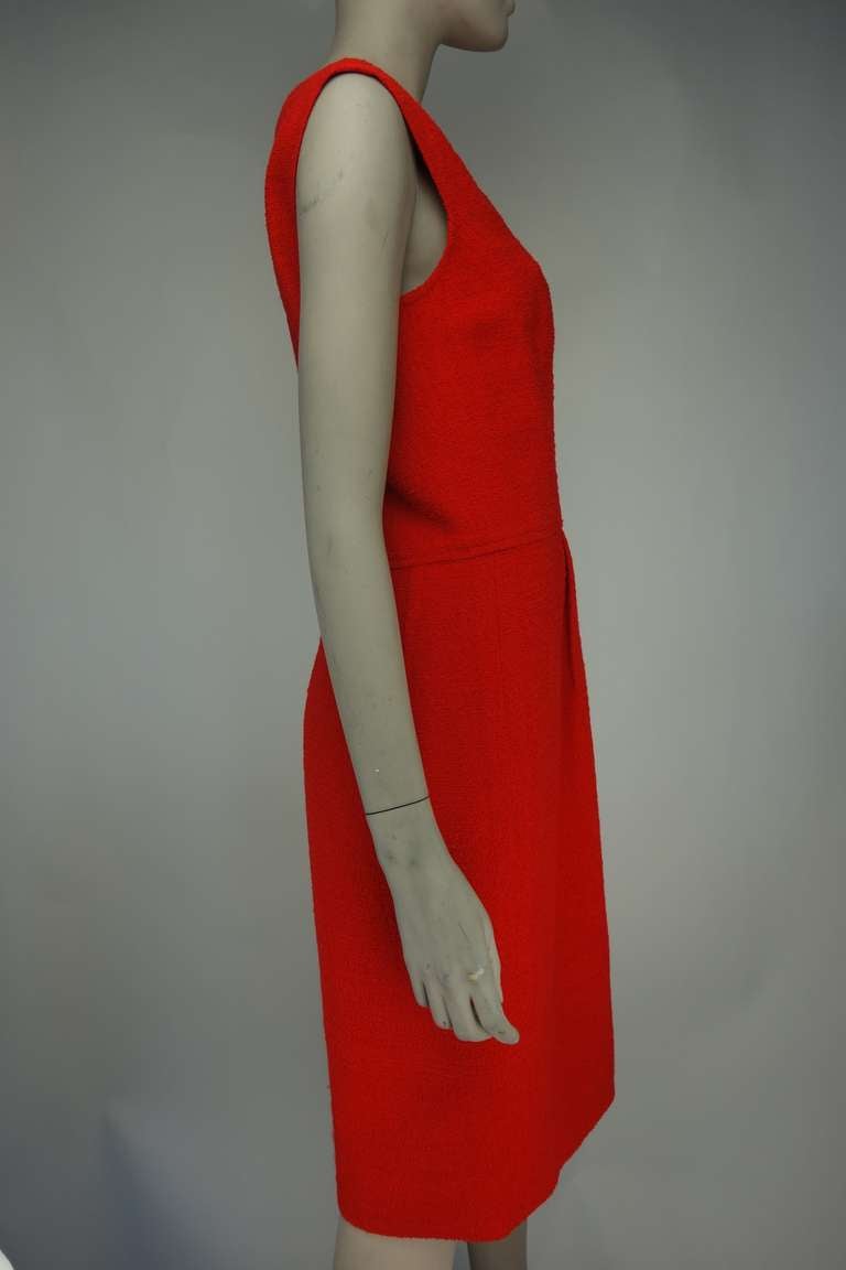 Oscar de la Renta sleeveless red wool dress with back zipper, fully lined in silk.