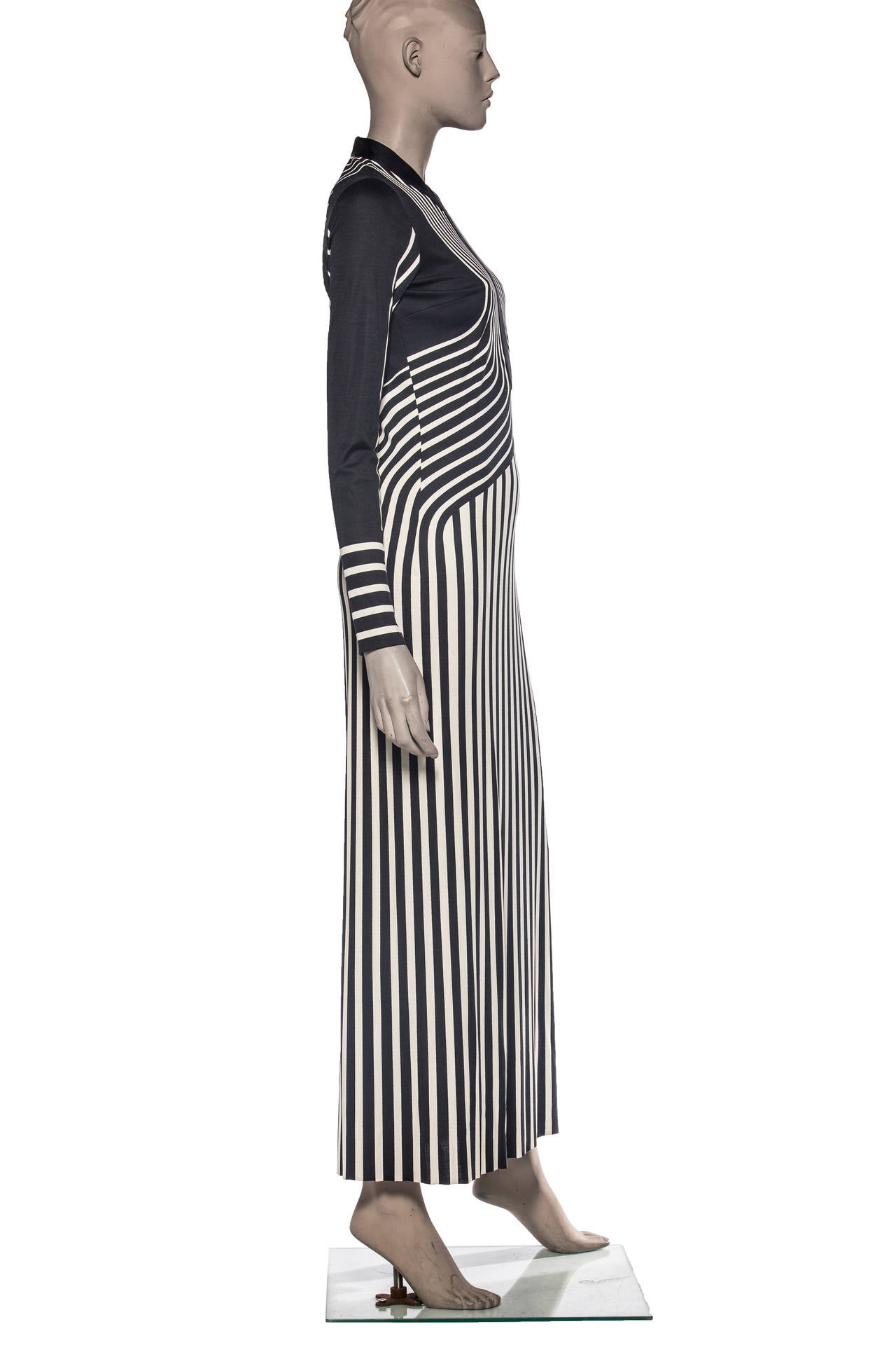 Marc Jacobs, Spring 2013, long sleeve silk dress with striped print throughout, V-neck and hidden zip closure at center back featuring hook at top.

Bust 30