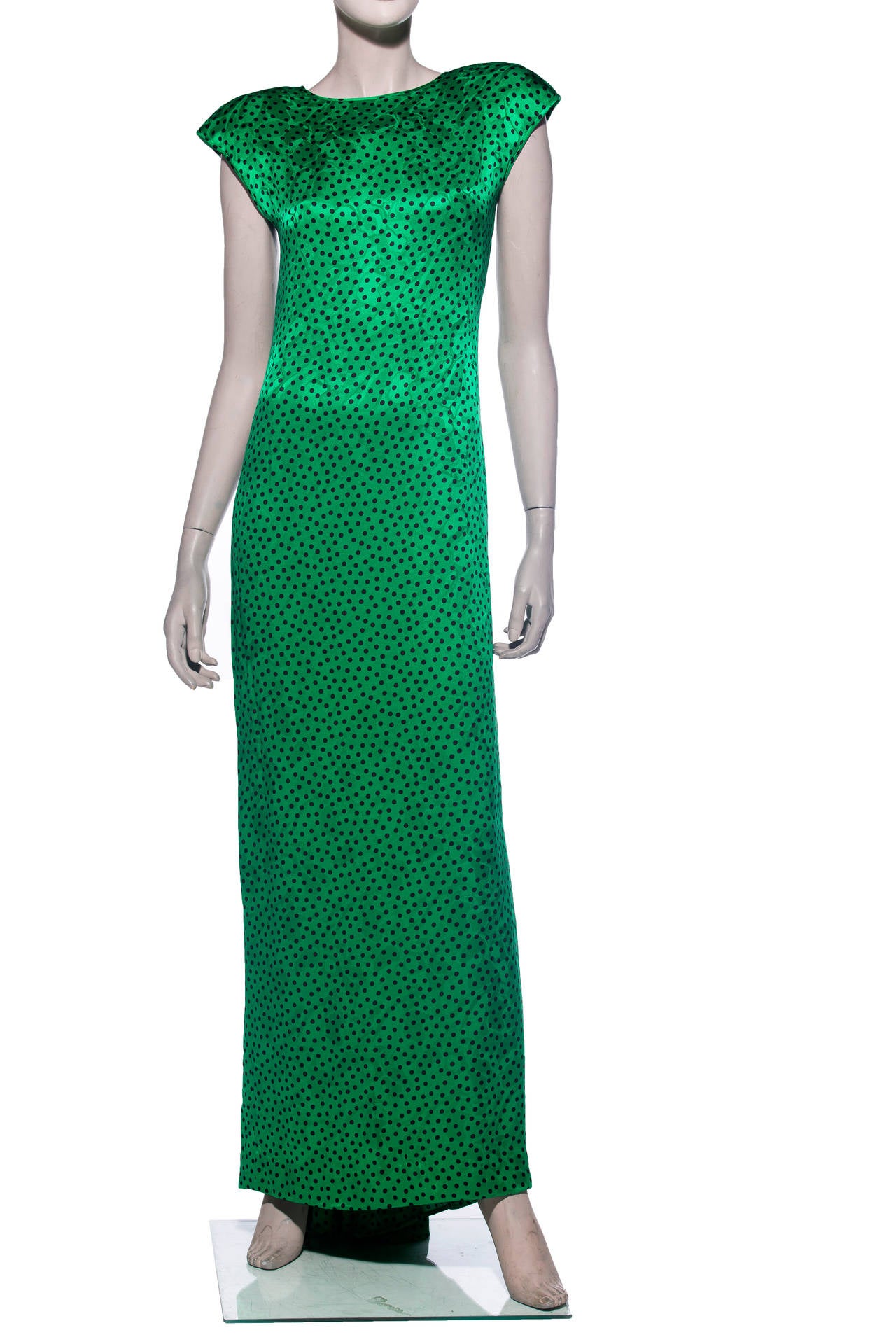 Valentino, circa 1980's emerald green silk gown with black polka dots, shoulder pads and side zip.