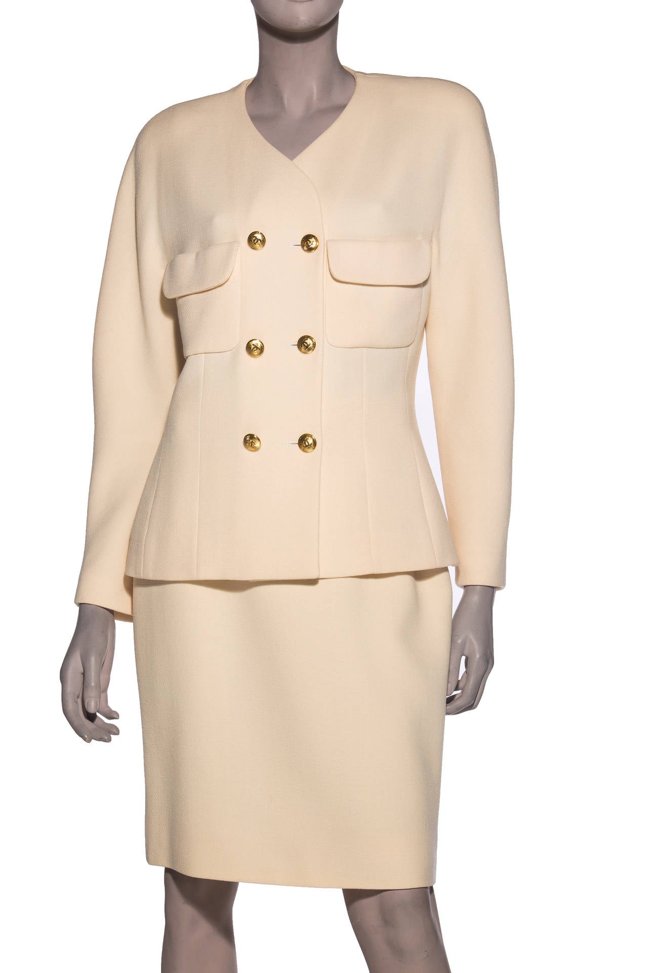 Chanel ivory wool crepe skirt suit with gold-tone CC buttons and fully lined.