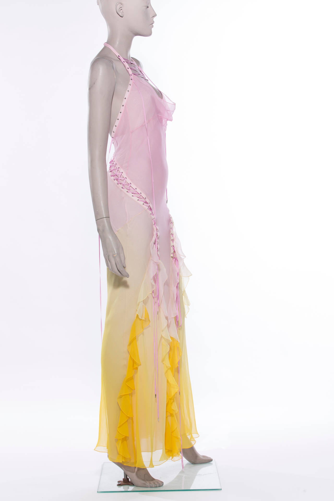 Christian Dior by John Galliano ombre sleeveless, multi layer, silk chiffon gown with buckle closure at back.

Bust 32”, Waist 30”, Hip 36”, Length 52”

EU. 42
US. 6