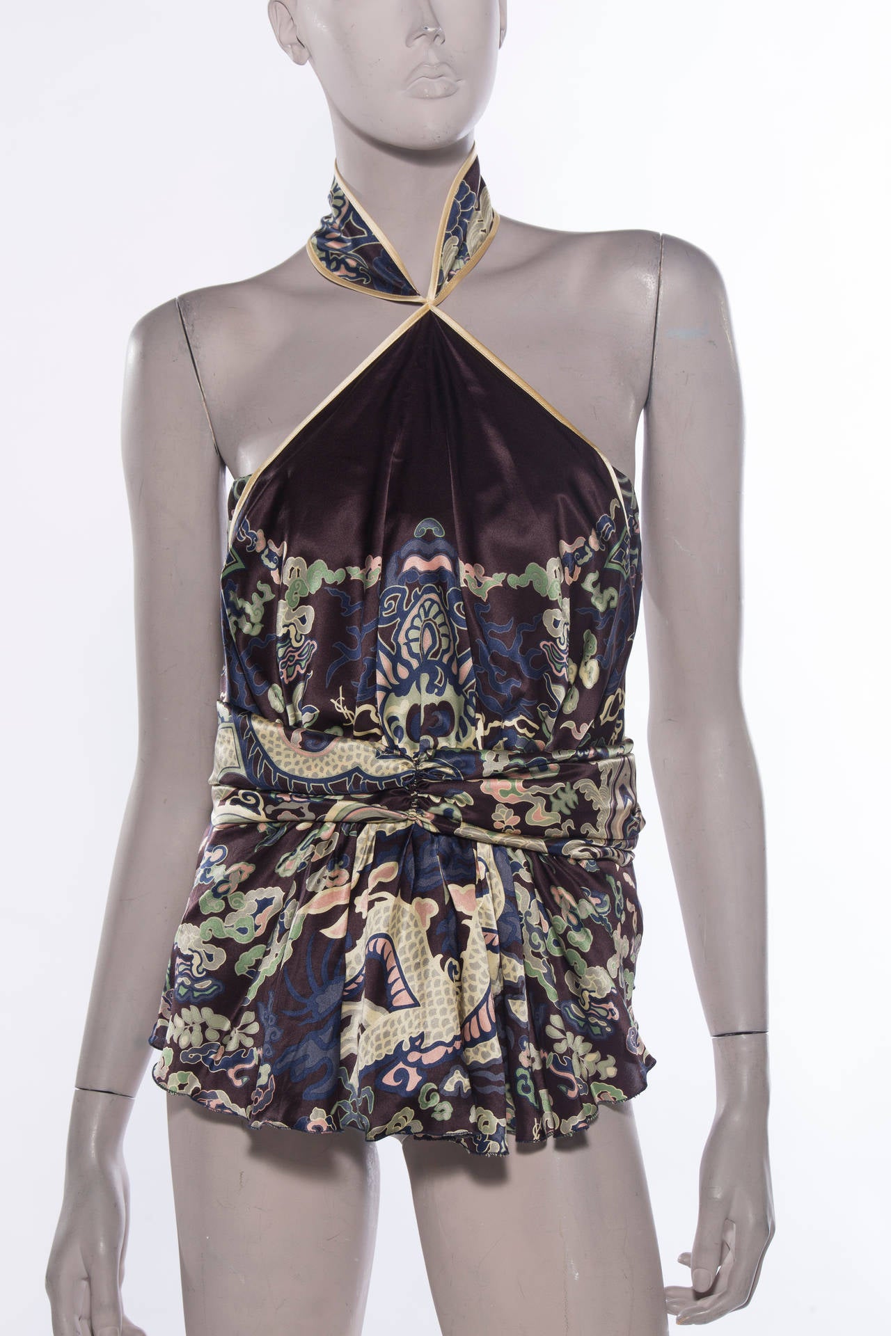 Tom Ford for Yves Saint Laurent, Fall 2004, silk bustier with dragon and floral print throughout, corset interior lining, draped accents throughout, invisible zip closure at center back and fully lined in silk.

Bust 34
