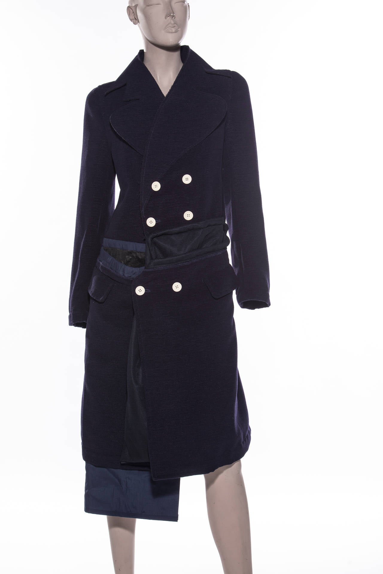Comme des Garcons, 2007, button front coat with oversize drawstring pockets.