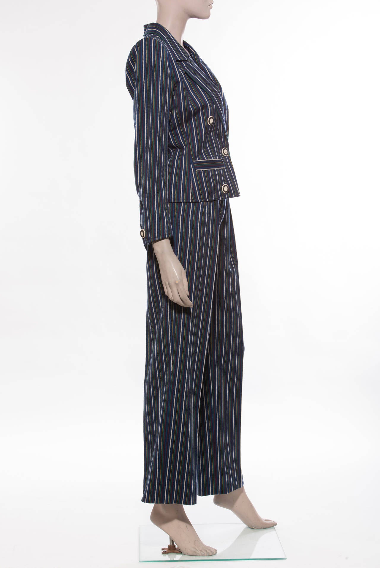 Yves Saint Laurent, circa 1980's, unlabeled navy blue, wool, double breasted pinstripe pant suit.