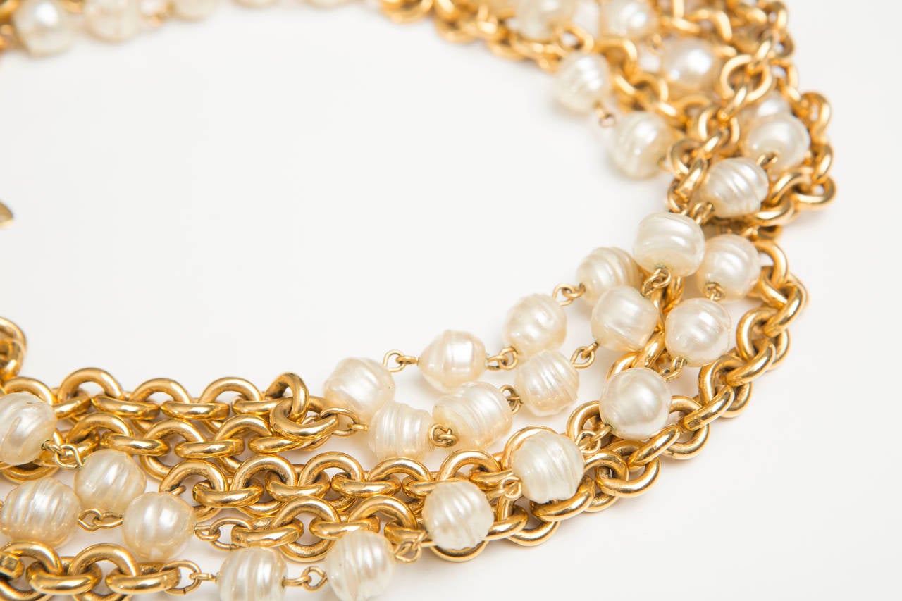 Chanel, circa 1985 chain and pearl necklace with spring ring closure. 