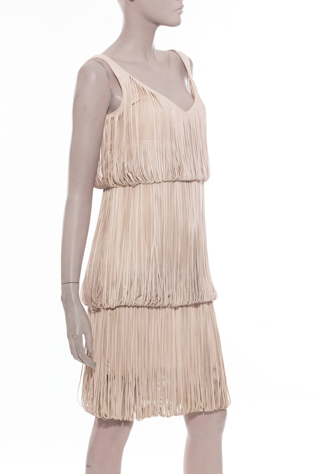 Alexander McQueen leather fringe dress with scoop neckline.Bust 34”,