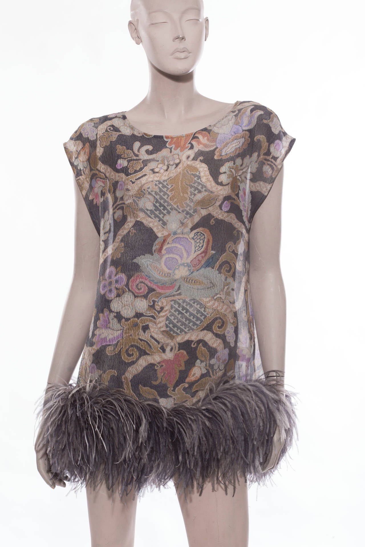 Dries Van Noten, Fall 2013 Grey and silk printed sleeveless tunic with feather trim and scoop neckline.

Bust 44