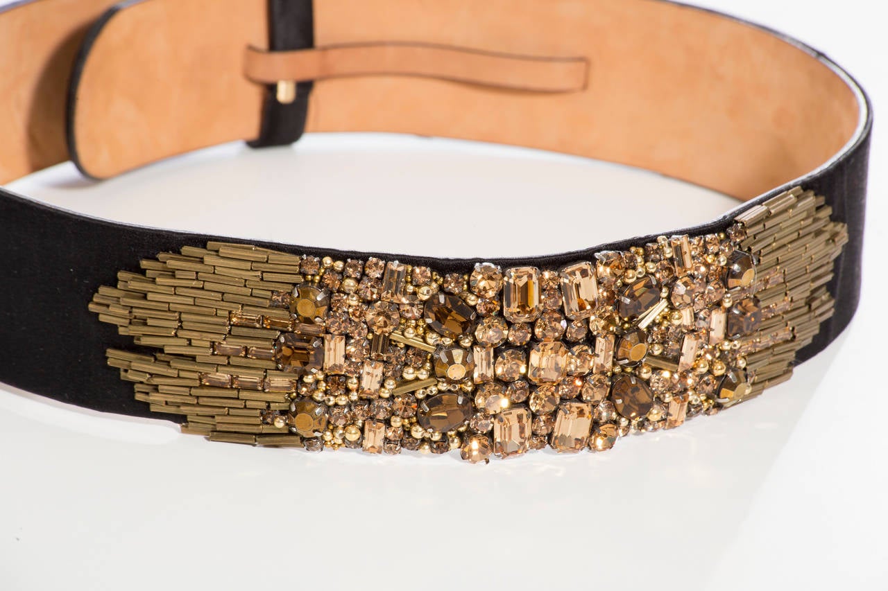 Alexander McQueen black satin embellished belt with adjustable snap closure.

Length 31-33