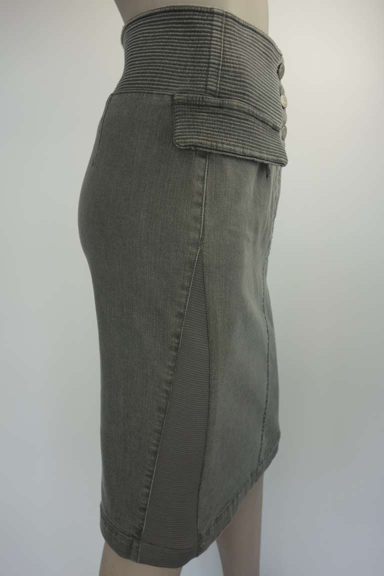 Alexander McQueen grey skirt, button front and zip with button back vent.