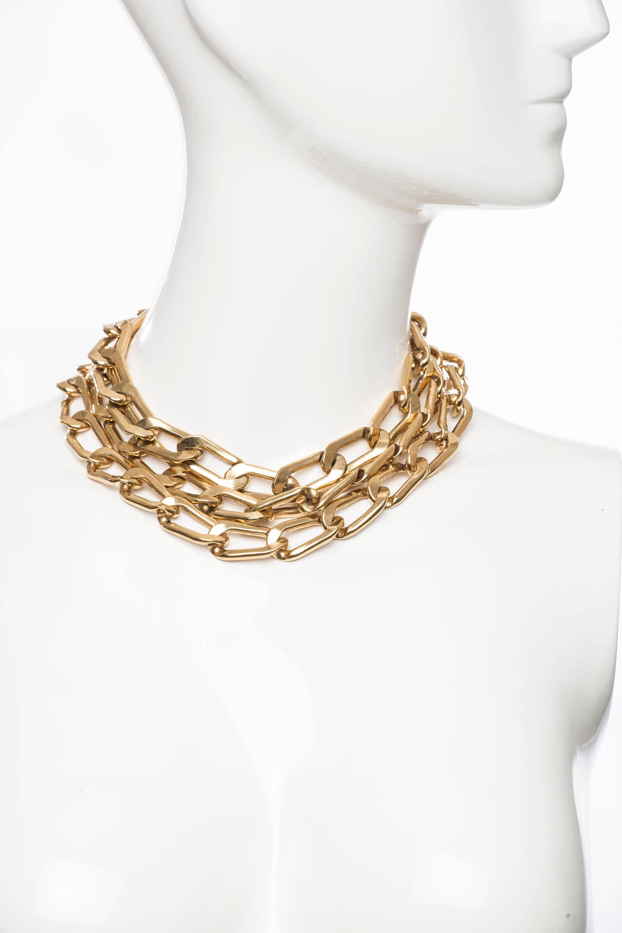 Lanvin Pre-Fall 2011gold-tone amoeba multistrand necklace with crystal embellishments and toggle lock closure. Pendant can be worn as a brooch with pin back closure. Includes box

Chain Length 18”, Ornament Width 3”, Ornament Length 3”