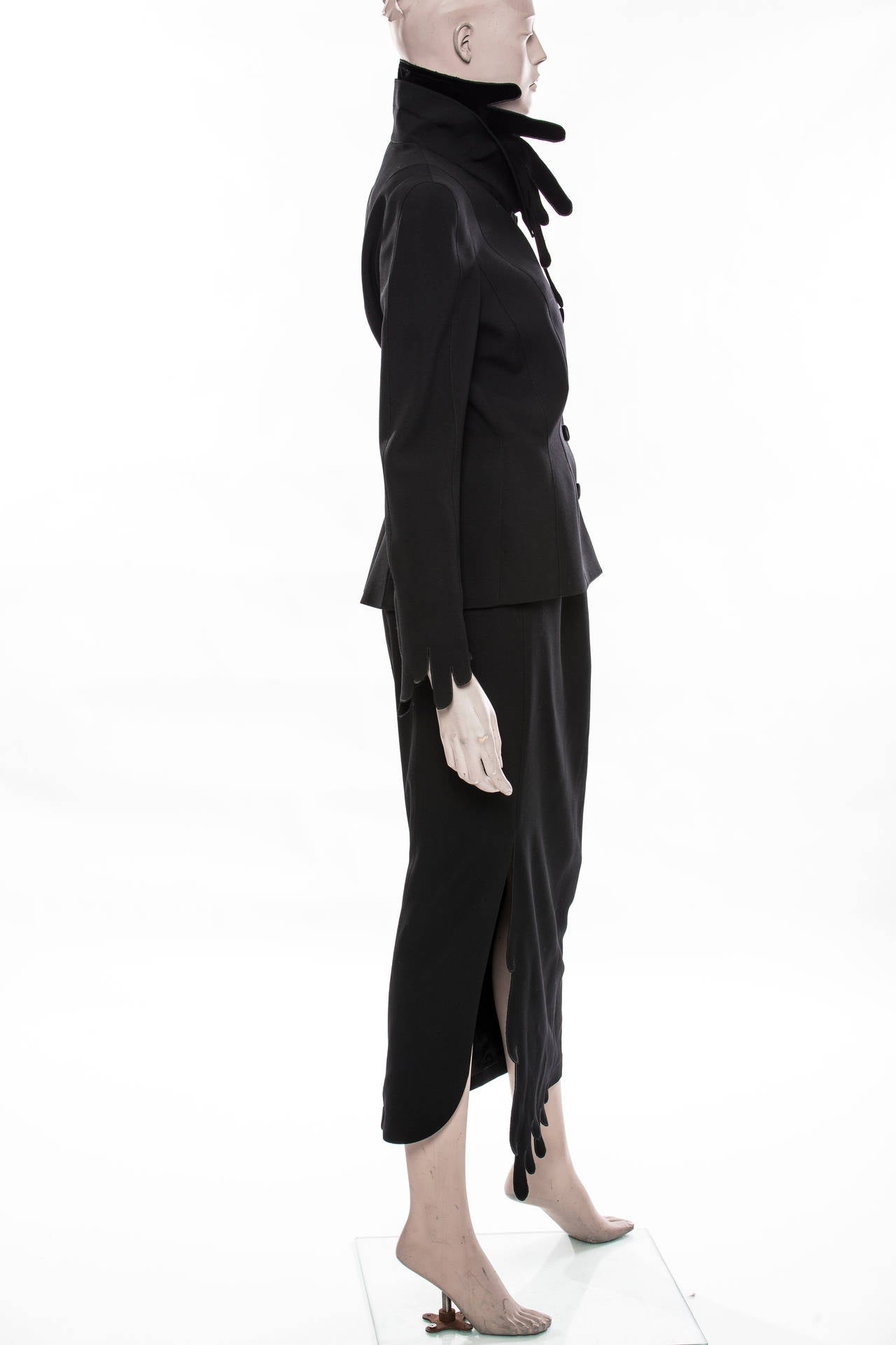 Thierry Mugler, circa 1980's black skirt suit, snap front, velvet buttons, skirt has side zip and fully lined.
