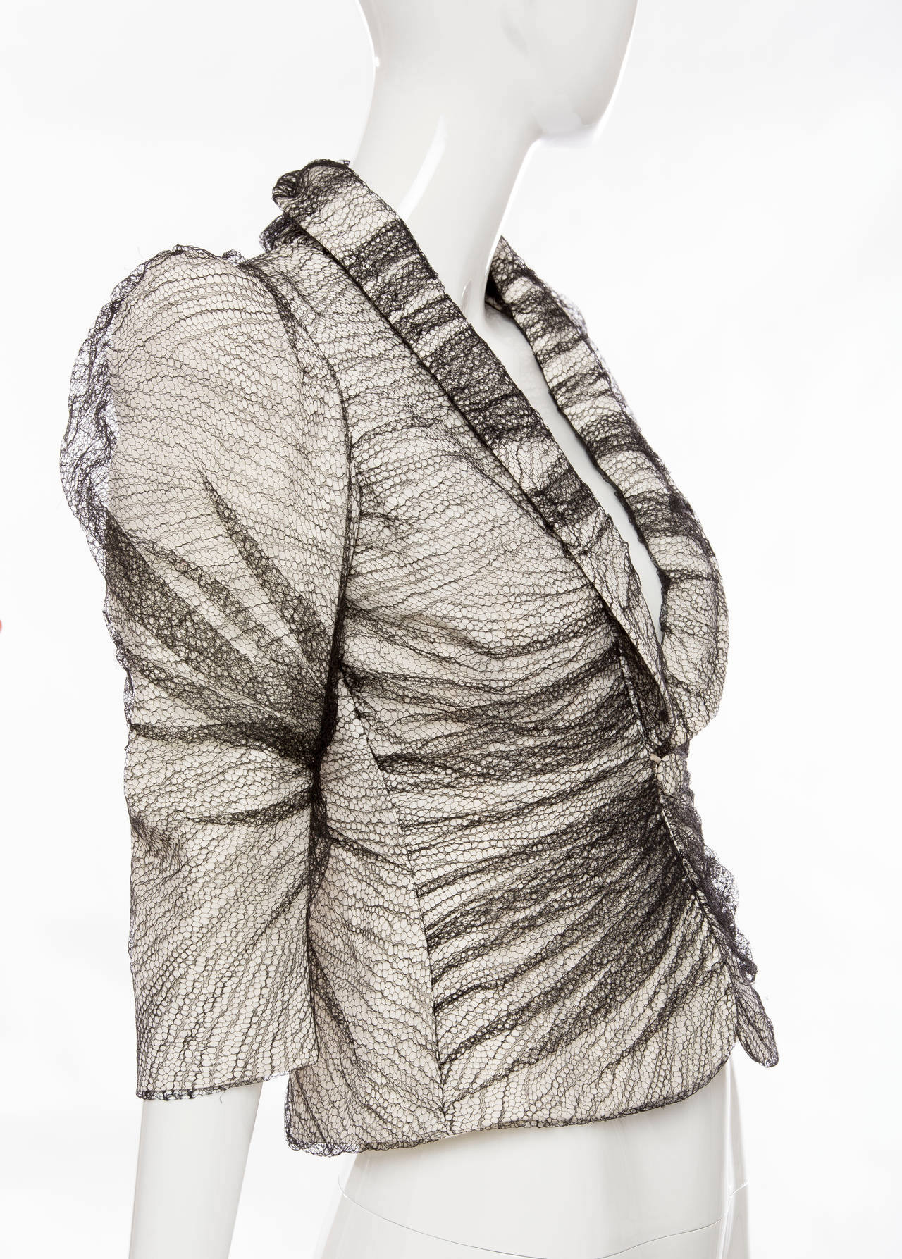 Alexander McQueen, Spring-Summer 2007, Sarabande collection tulle overlay button front jacket and fully lined.

