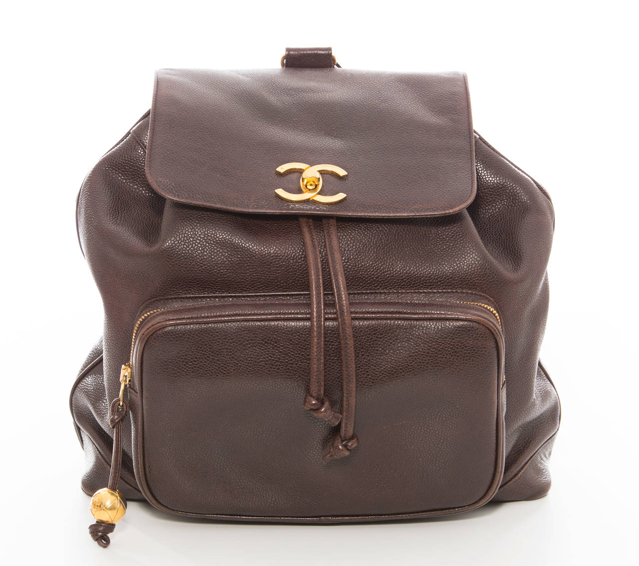 Chanel, Circa 1990's, chocolate brown leather backpack with gold-tone hardware.