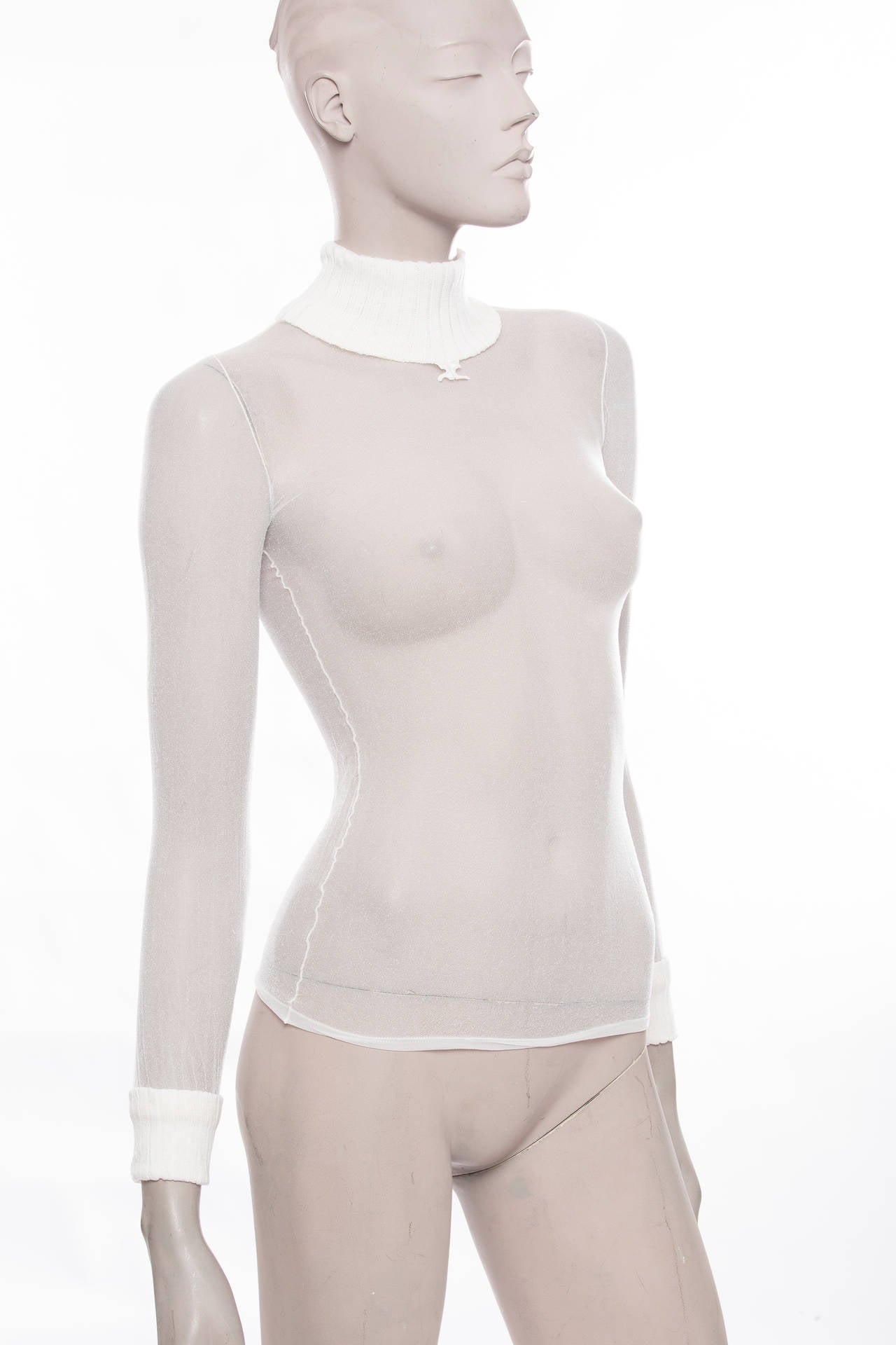 Courreges, circa 1960's stretch nylon, sheer turtleneck with original packaging.