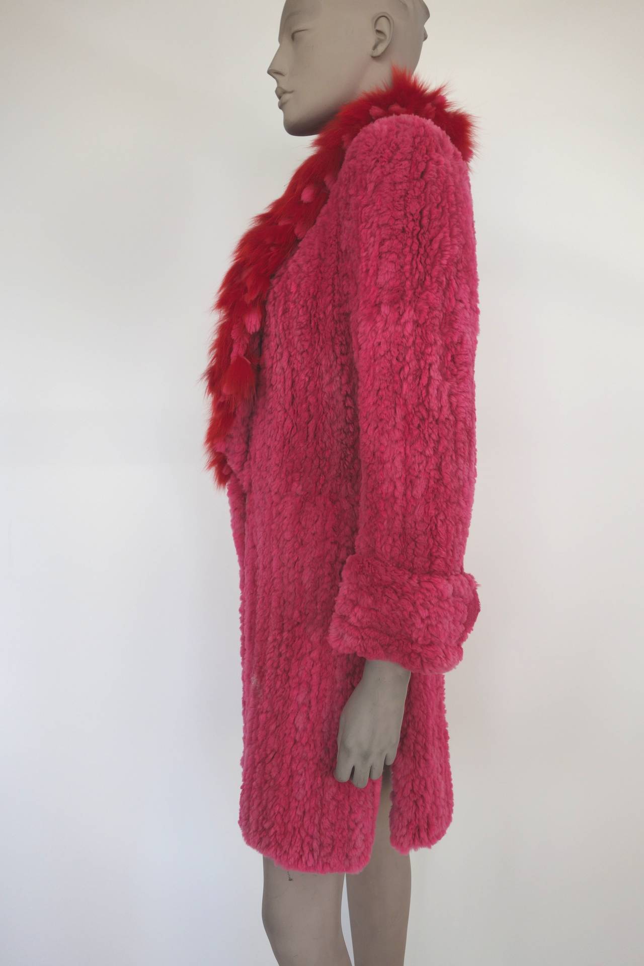 Fleur and Mike Mosler pink with red lapel shirred mink coat.