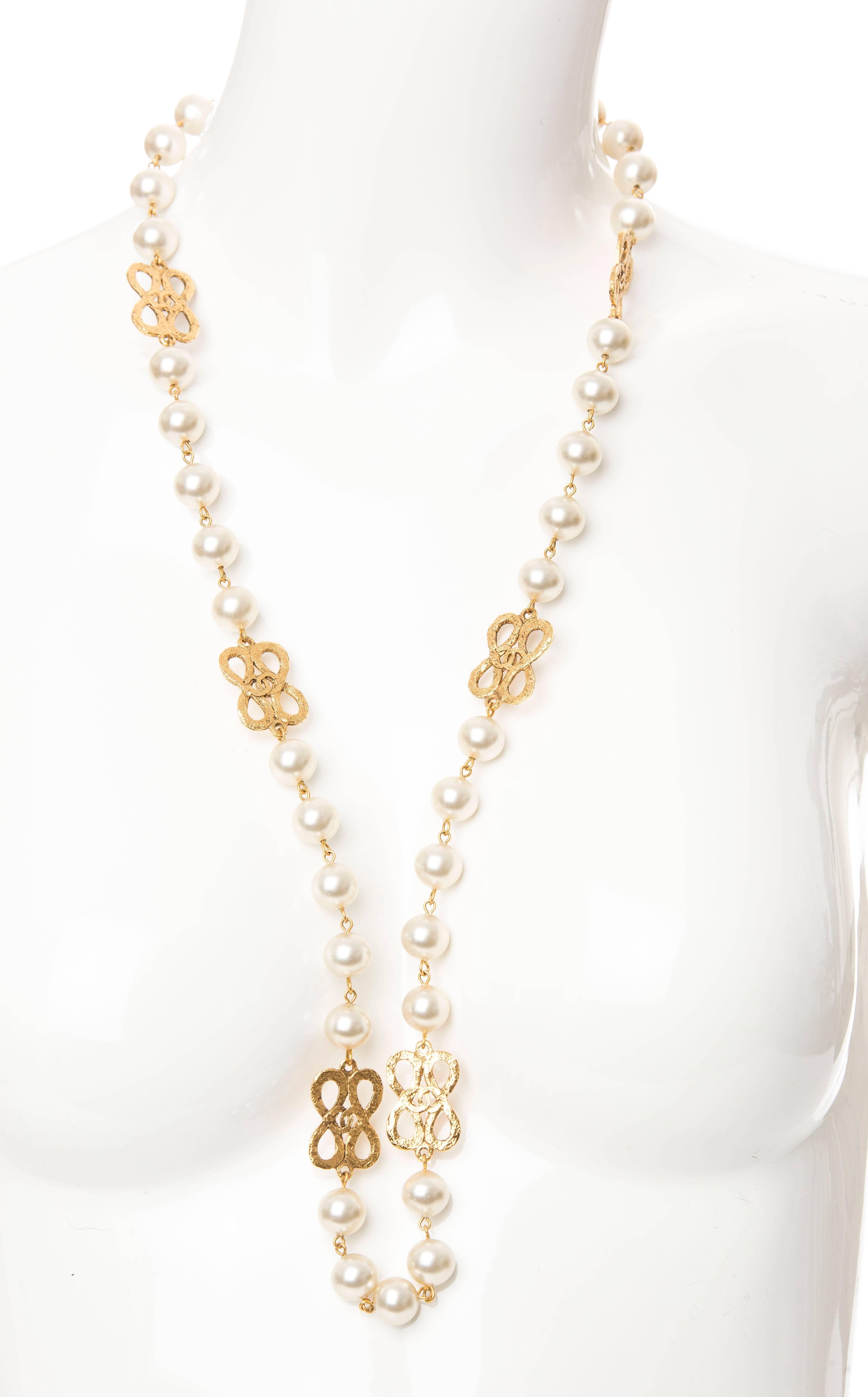 Chanel pearls, circa 1980's with gold-tone CC pendants.