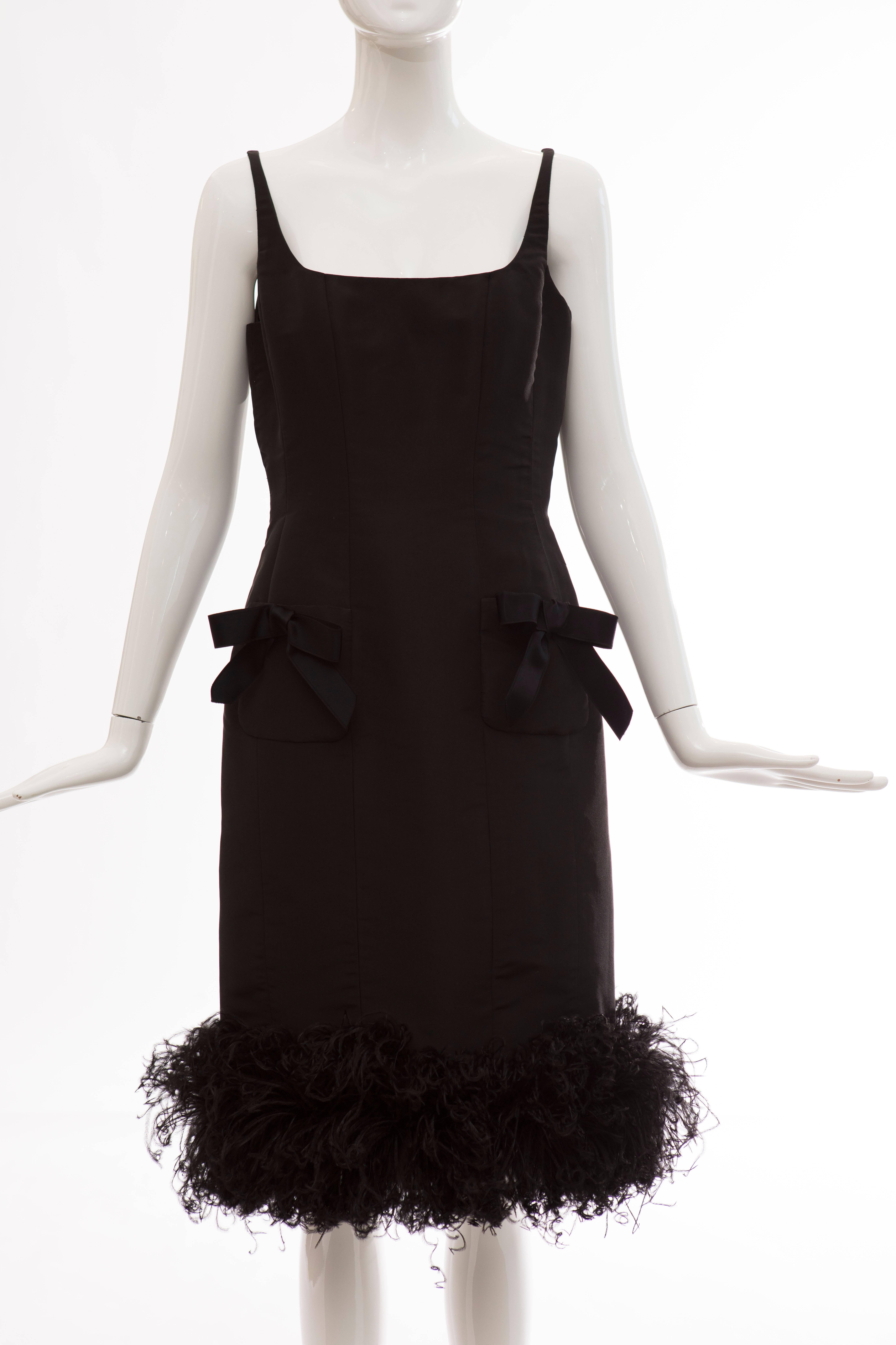 Oscar de la Renta, Runway Fall 2004, black silk faille sleeveless dress with Ostrich feather hem, two patch front pockets with silk satin bows, back zip and hook-and-eye closure, fully lined in silk.

US. 8

Bust 34, Waist 32, Hips 38, Length 41