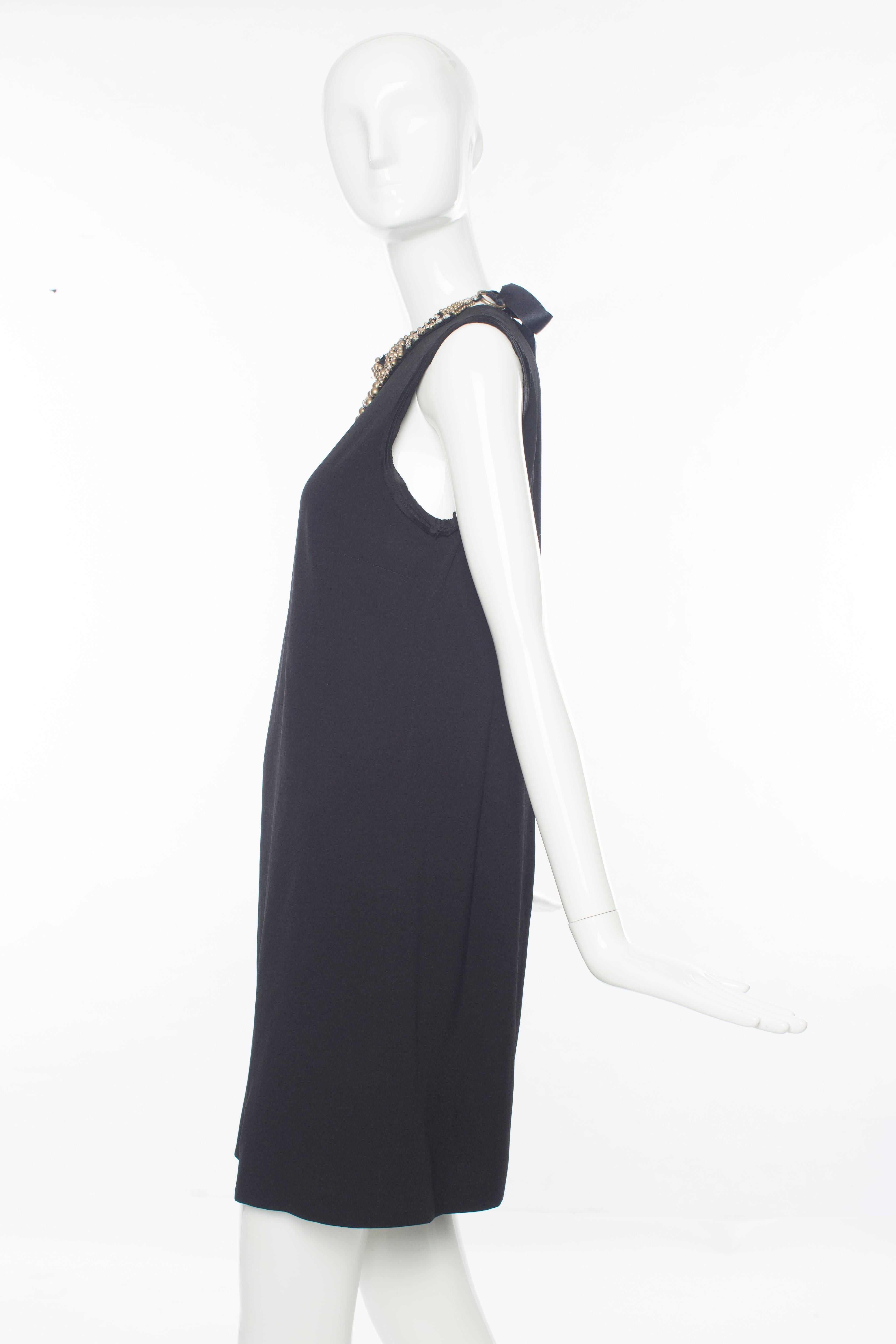 Alber Elbaz for Lanvin, Fall 2007, black sleeveless viscose sheath dress, antiqued silver and prong-set embellished collar, concealed back zip and snap closure, fully lined in silk.

FR. 38
US. 6

Bust 34, Waist 34, Hips 37, Length 35