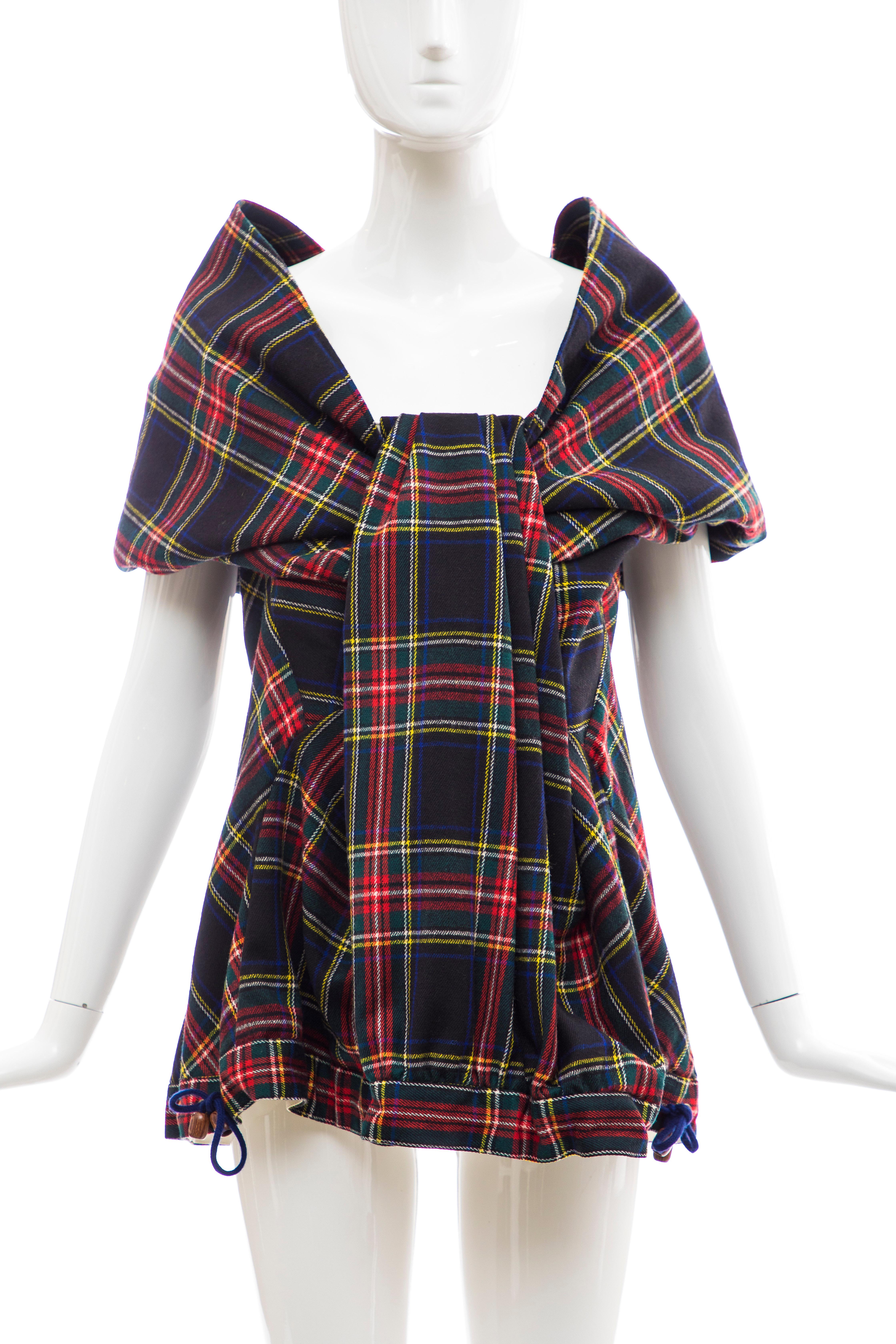  20471120, Circa:2002 sleeveless avant-garde tartan plaid top with built in brasiere.

Bust 34 inch, Waist 34 inch, Hips 48 inch, Total Length 27 inch