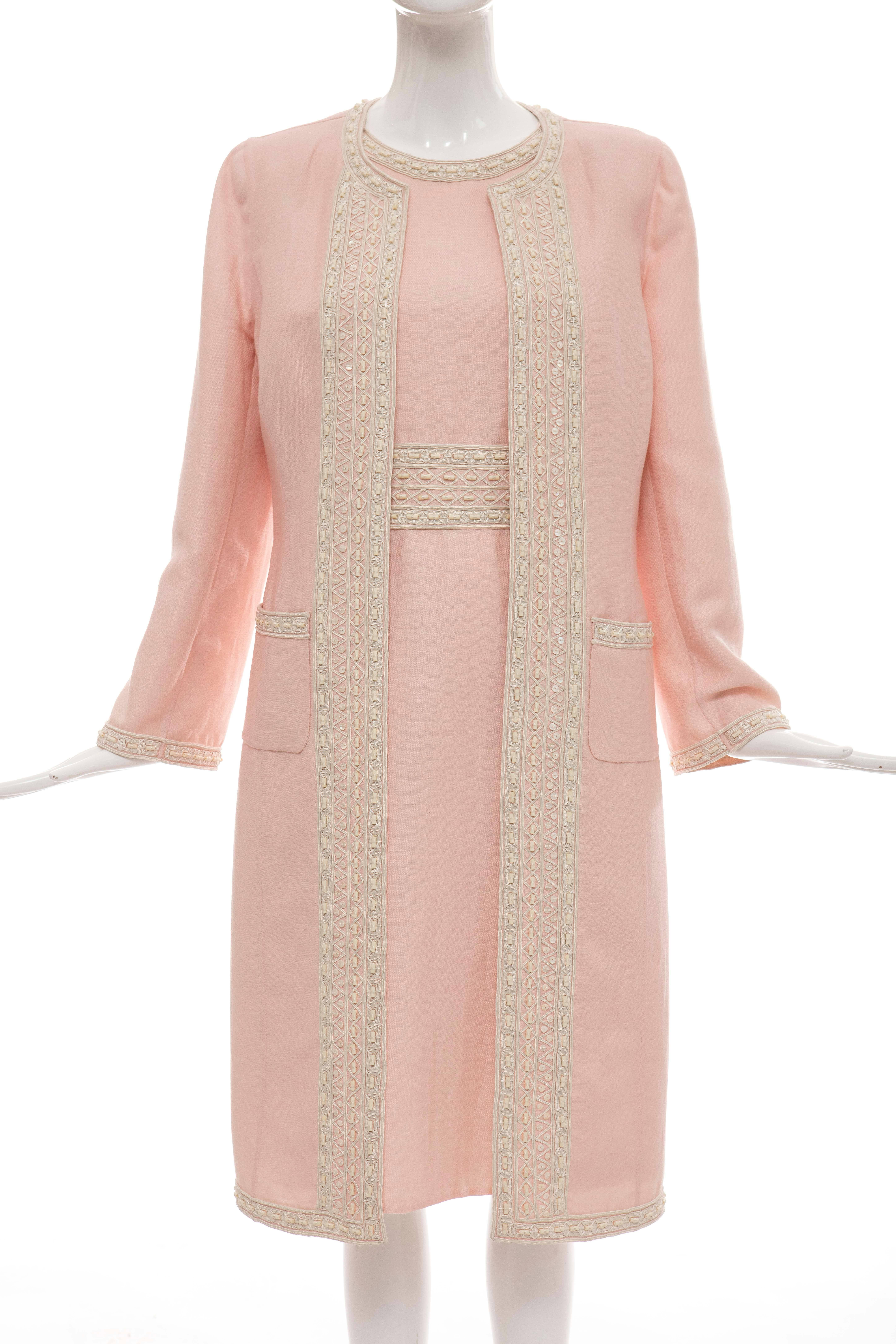 Oscar De la Renta, Resort 2006 pink wool linen cotton dress ensemble. Sleeveless embroidered dress with back zip with hook and eye closure. Embroidered coat with two front pockets.

Dress US. 10

Coat US. 8

Dress: Bust 36, Waist 30, Hips 40, Length
