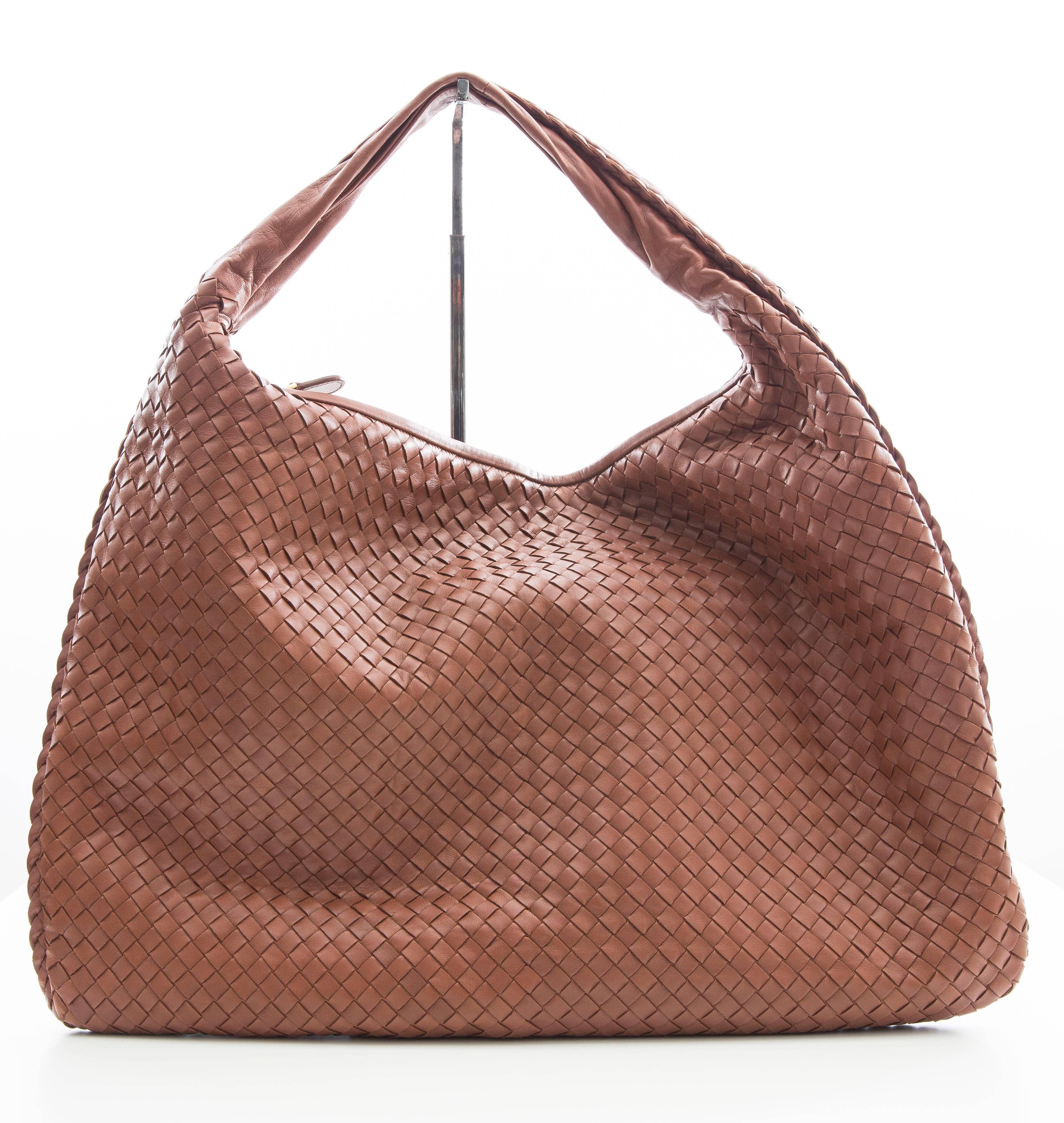 Bottega Veneta Large Intrecciato Hobo with flat shoulder strap, tonal stitching throughout, suede lining, dual pockets at interior walls; one featuring zip closure and zip closure at top. Includes dust bag.

Shoulder Strap Drop 7”, Height 12”,