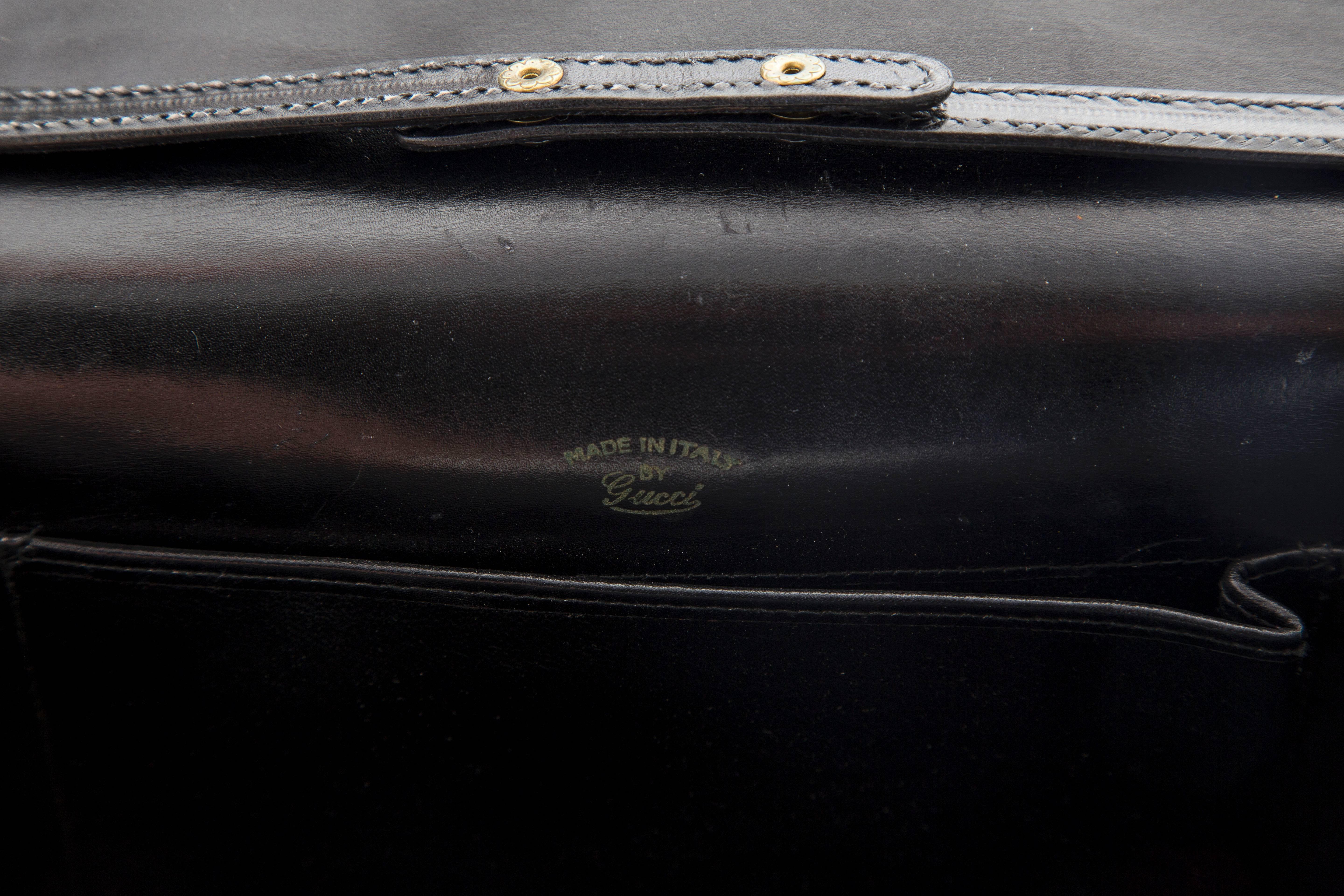 Gucci Black Leather Clutch With Detachable Shoulder Strap, Circa 1970s In Good Condition In Cincinnati, OH