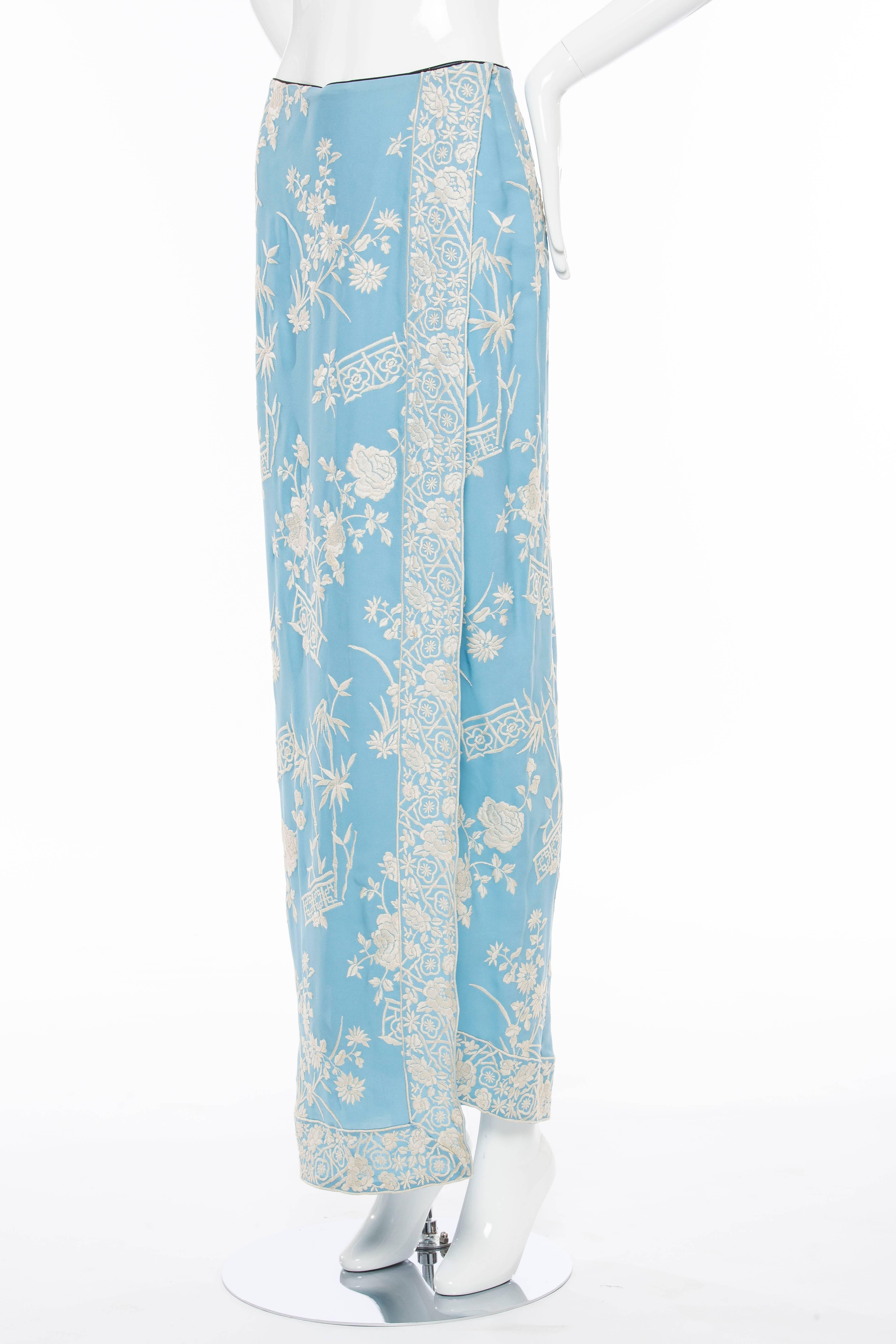 Dolce & Gabbana, Spring/Summer, circa 1997  China Collection, silk wedgwood blue embroidered skirt with snap front.

Waist 26”, Hip 32”, Length 42”

IT. 42
US. 6