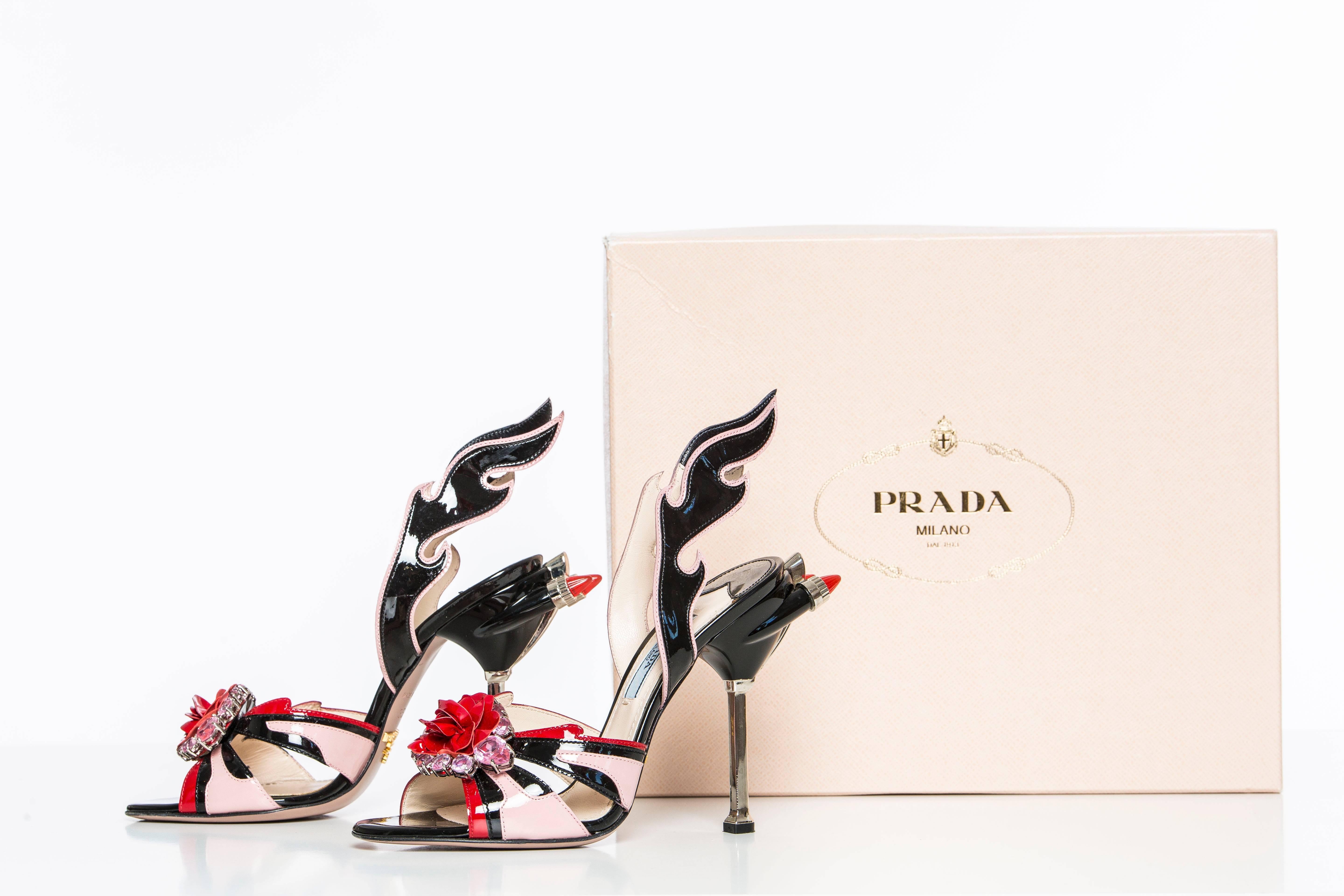 Prada, Spring - Summer 2012, black, pink and red patent leather sandals with jewel embellishments at tops, tonal stitching throughout and silver-tone heels. Includes box and dust bag.